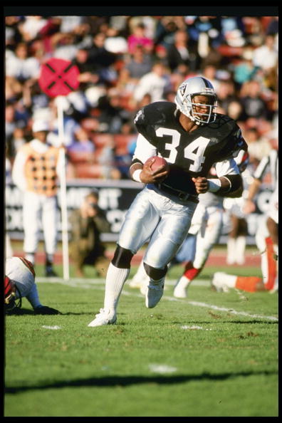16 Dec 1990: Running back Bo Jackson of the Los Angeles Raiders runs down the field during a game against the Cincinnati Bengals at the Los Angeles Coliseum in Los Angeles, California. The Raiders won the game 24-7.