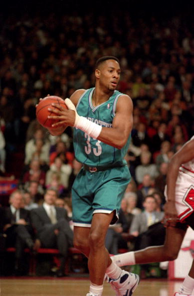 1993:  ALONZO MOURNING OF THE CHARLOTTE HORNETS LOOKS TO PASS IN A GAME AGAINST THE CHICAGO BULLS AT THE UNITED CENTER IN CHICAGO, ILLINOIS. Mandatory Credit: Jonathan Daniel/ALLSPORT