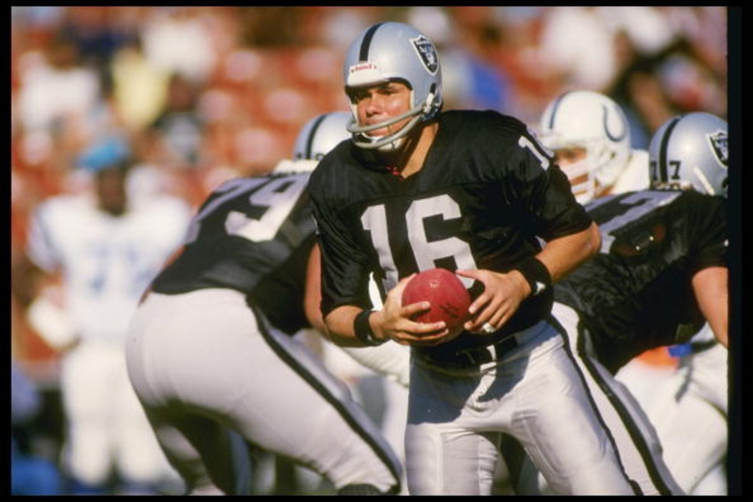 21 Dec 1986: Quarterback Jim Plunkett of the Los Angeles Raiders dropping back during game against the Indianapolis Colts at the Los Angeles Memorial Colesium in Los Angeles, California. The Colts won the games 30-24. Mandatory Credit: Stephen Dunn /Al 21 Dec 1986: Quarterback Jim Plunkett of the Los Angeles Raiders dropping back during game against the Indianapolis Colts at the Los Angeles Memorial Colesium in Los Angeles, California. The Colts won the games 30-24. Mandatory Credit: Stephen Dunn /Al