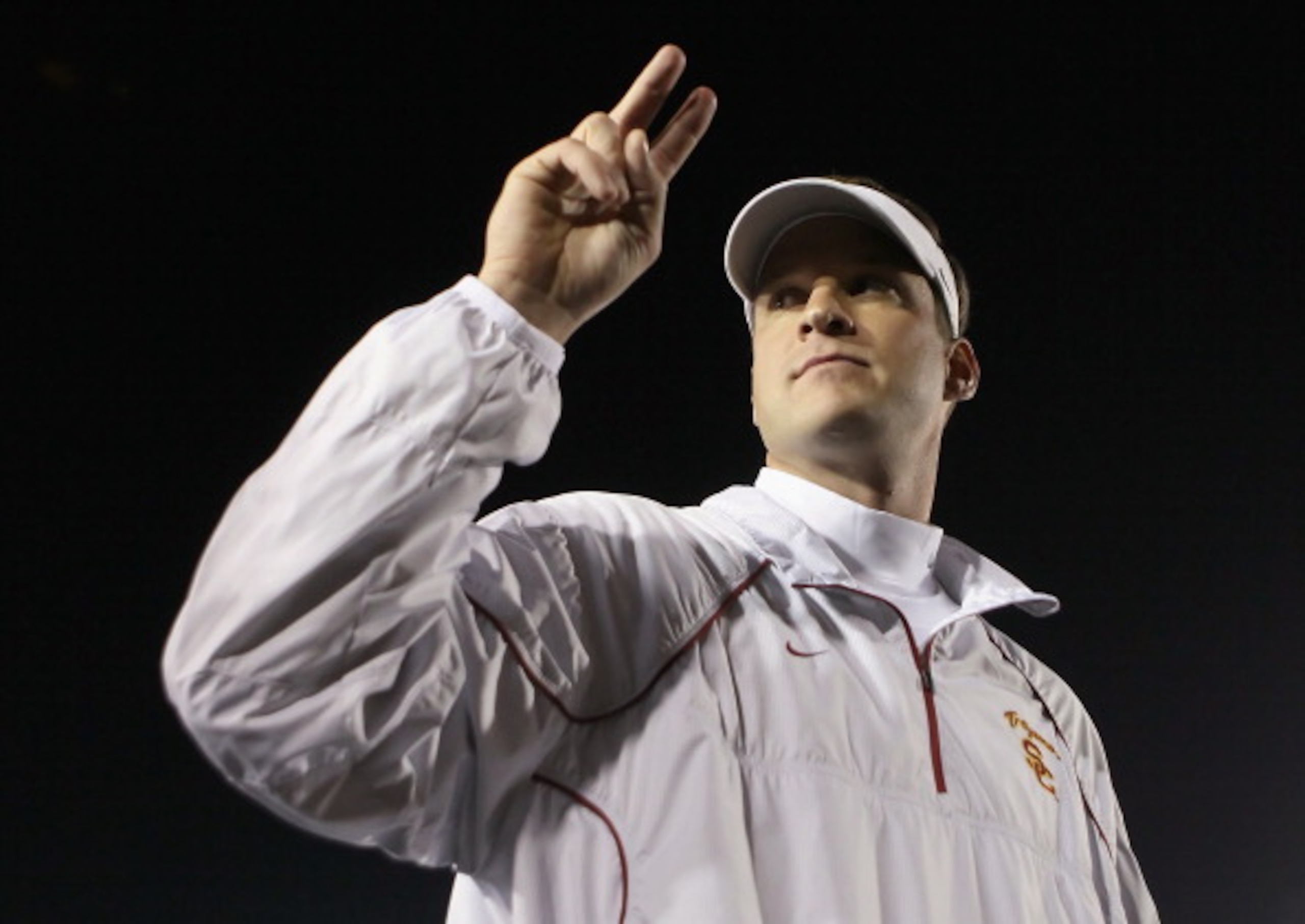 PASADENA, CA - DECEMBER 04: USC Trojans head coach Lane Kiffin celebrates following his teams victory over the UCLA Bruins at the Rose Bowl on December 4, 2010 in Pasadena, California. USC defeated UCLA 28-14. (Photo by Jeff Gross/Getty Images) PASADENA, CA - DECEMBER 04: USC Trojans head coach Lane Kiffin celebrates following his teams victory over the UCLA Bruins at the Rose Bowl on December 4, 2010 in Pasadena, California. USC defeated UCLA 28-14. (Photo by Jeff Gross/Getty Images)