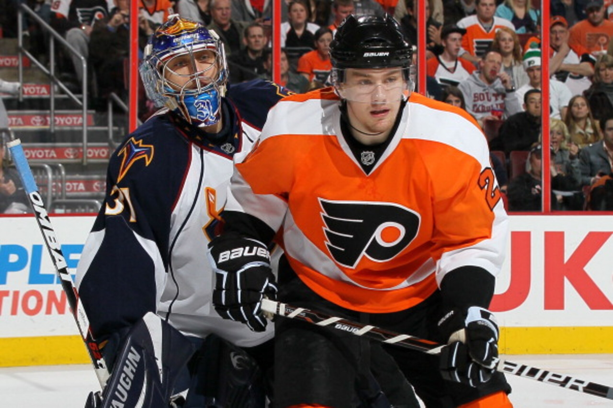 PHILADELPHIA, PA - MARCH 12:  James van Riemsdyk #21 of the Philadelphia Flyers sets up a screen against Ondrej Pavelec #31 of the Atlanta Thrashers on March 12, 2011 at Wells Fargo Center in Philadelphia, Pennsylvania. The Thrashers defeated the Flyers 5