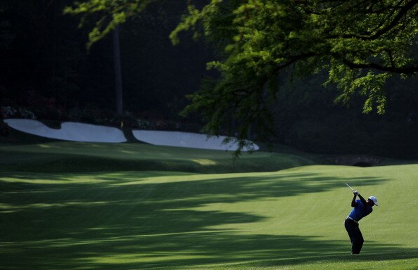 AUGUSTA, GA - APRIL 09:  Tiger Woods hits his second shot on the 13th hole during the third round of the 2011 Masters Tournament at Augusta National Golf Club on April 9, 2011 in Augusta, Georgia.  (Photo by Harry How/Getty Images)