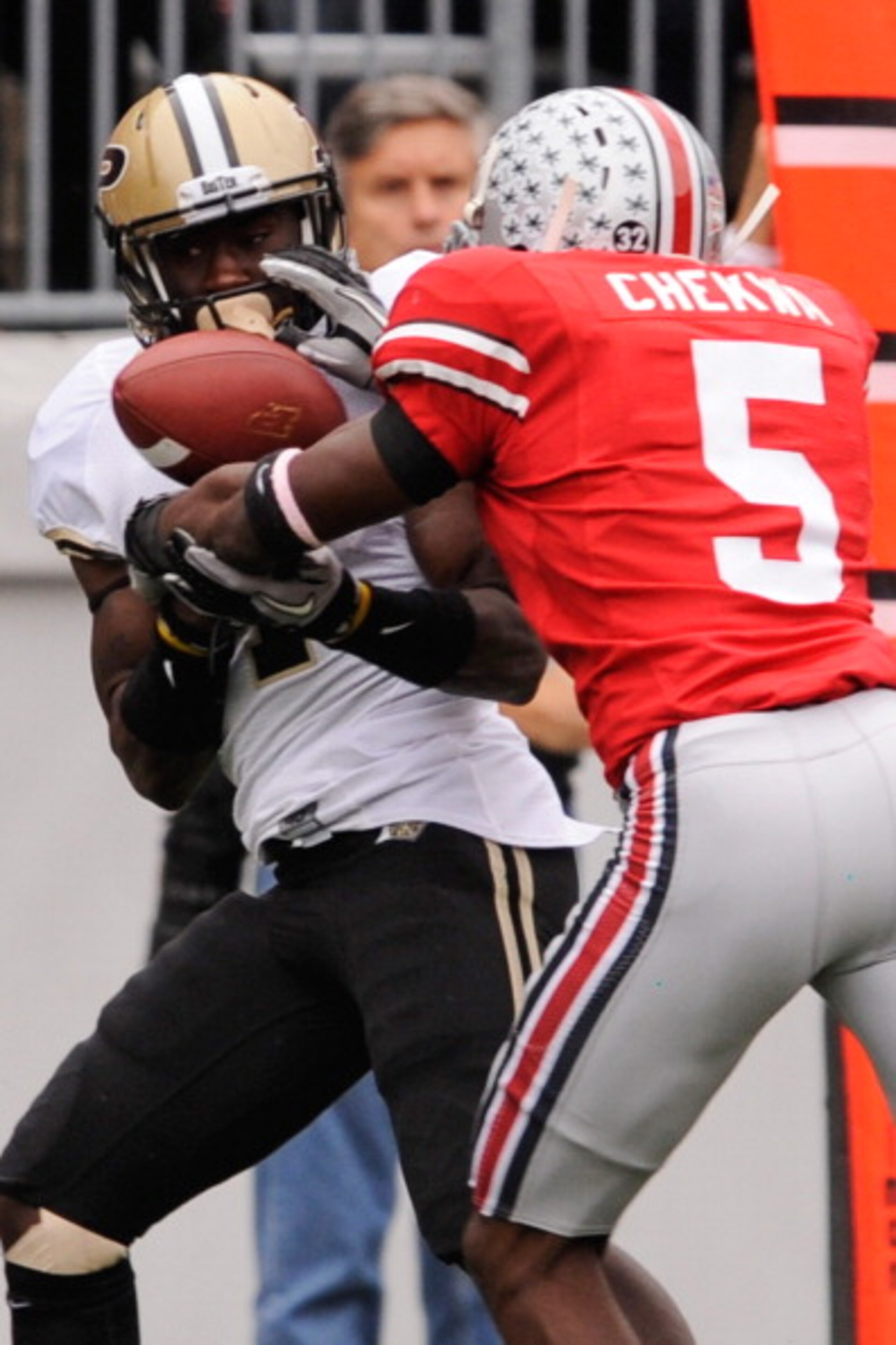 COLUMBUS, OH - OCTOBER 23:  Chimdi Chekwa #5 of the Ohio State Buckeyes breaks up a pass intended for O.J. Ross #4 of the Purdue Boilermakers at Ohio Stadium on October 23, 2010 in Columbus, Ohio.  (Photo by Jamie Sabau/Getty Images)