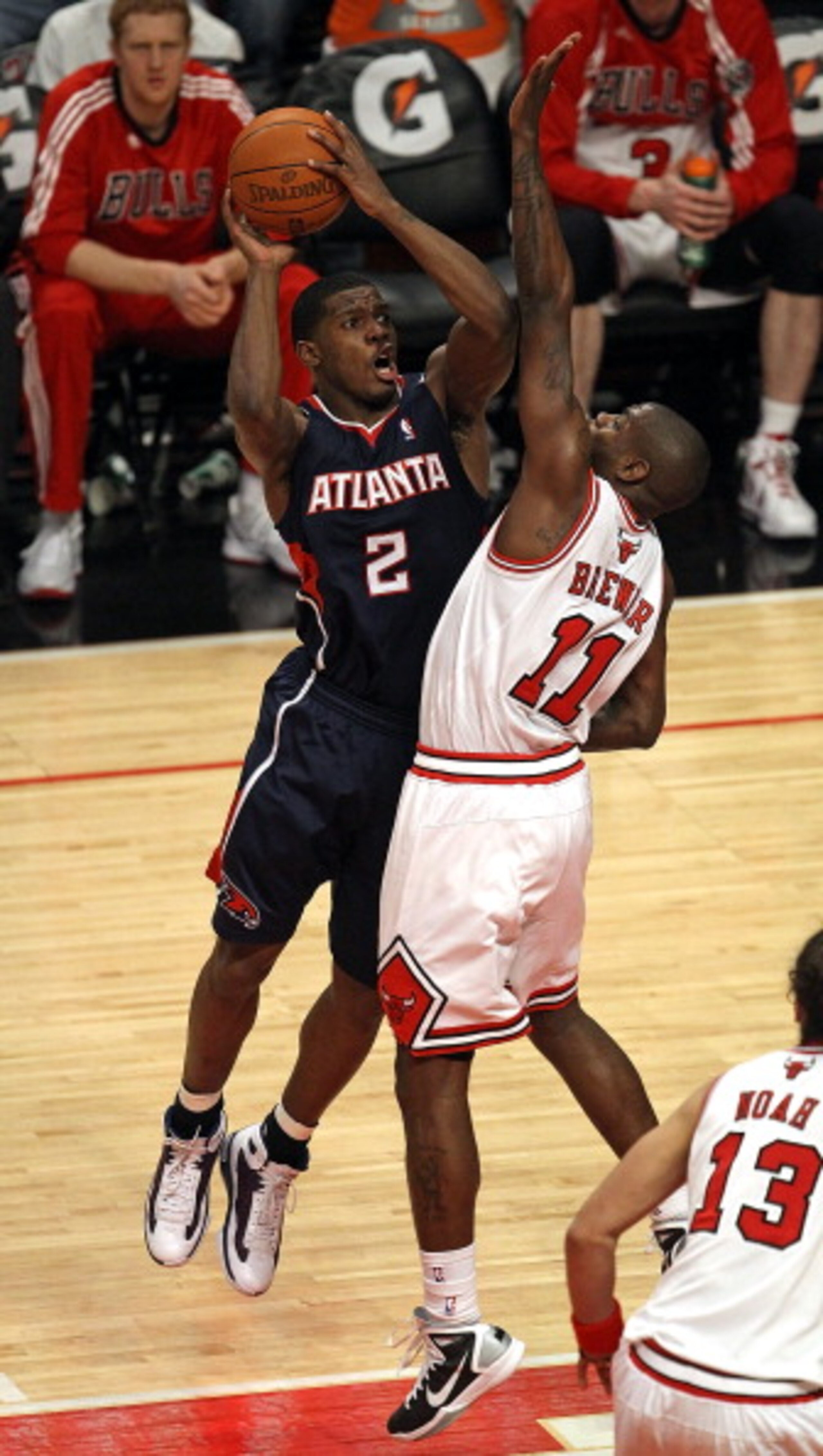 CHICAGO, IL - MARCH 11: Joe Johnson #2 of the Atlanta Hawks puts up a shot under pressure from Ronnie Brewer #11 of the Chicago Bulls at the United Center on March 11, 2011 in Chicago, Illinois. The Bulls defeated the Hawks 94-76. NOTE TO USER: User expre CHICAGO, IL - MARCH 11: Joe Johnson #2 of the Atlanta Hawks puts up a shot under pressure from Ronnie Brewer #11 of the Chicago Bulls at the United Center on March 11, 2011 in Chicago, Illinois. The Bulls defeated the Hawks 94-76. NOTE TO USER: User expre