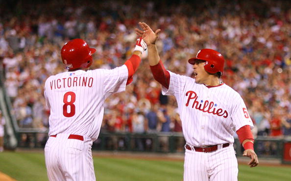 PHILADELPHIA - MAY 2: Center fielder Shane Victorino #8 of the Philadelphia Phillies is greeted by catcher Carlos Ruiz #51 after hitting a grand slam during a game against the New York Mets at Citizens Bank Park on May 2, 2010 in Philadelphia, Pennsylvani