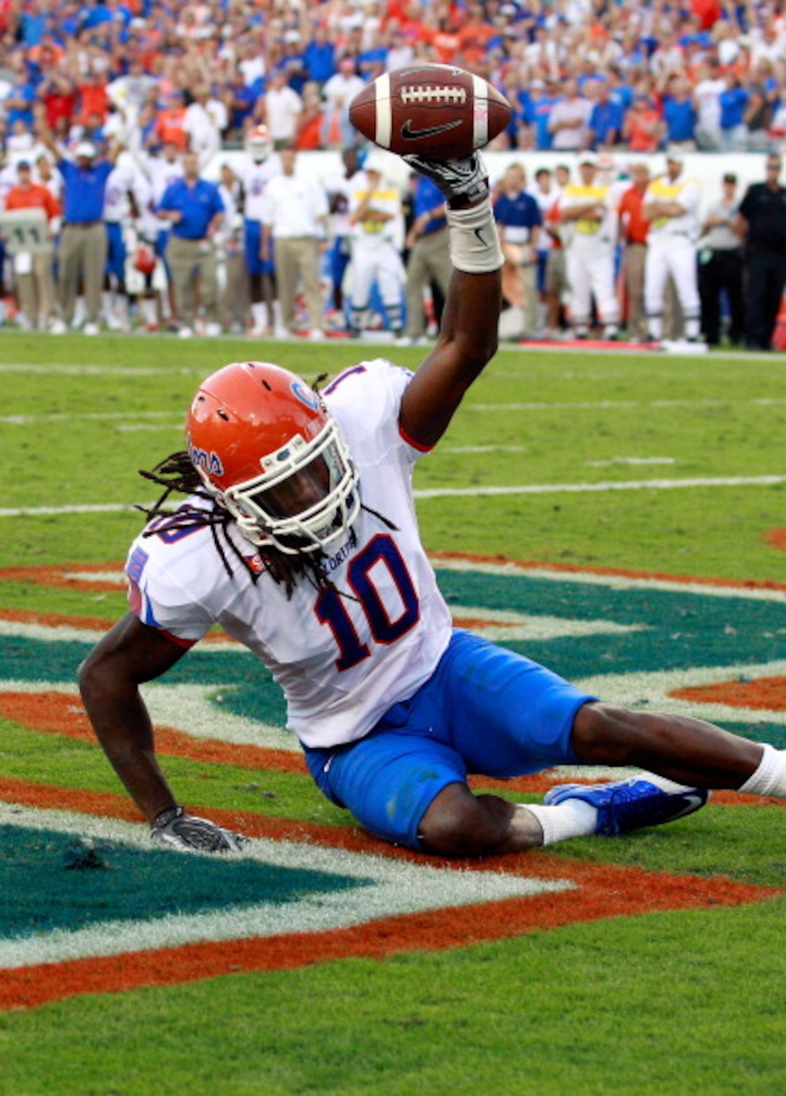 JACKSONVILLE, FL - OCTOBER 30:  Will Hill #10 of the Florida Gators holds up the ball after an interception during the game against the Georgia Bulldogs at EverBank Field on October 30, 2010 in Jacksonville, Florida.  (Photo by Sam Greenwood/Getty Images)