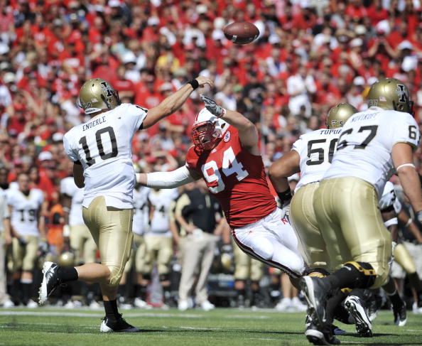 LINCOLN, NEBRASKA - SEPTEMBER 11: Idaho Vandals quarterback Nathan Enderle #10 throws a pass down field over Nebraska Cornhuskers defensive tackle Jared Crick #94 during second half action of their game at Memorial Stadium on September 4, 2010 in Lincoln,