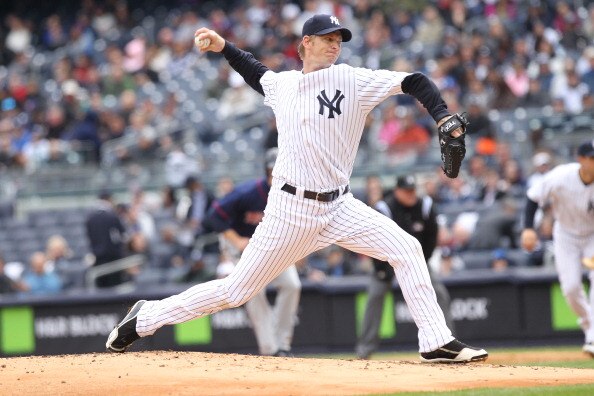 NEW YORK, NY - APRIL 07:  A.J. Burnett #34 of the New York Yankees pitches against the Minnesota Twins at Yankee Stadium on April 7, 2011 in the Bronx borough of New York City.  (Photo by Nick Laham/Getty Images)