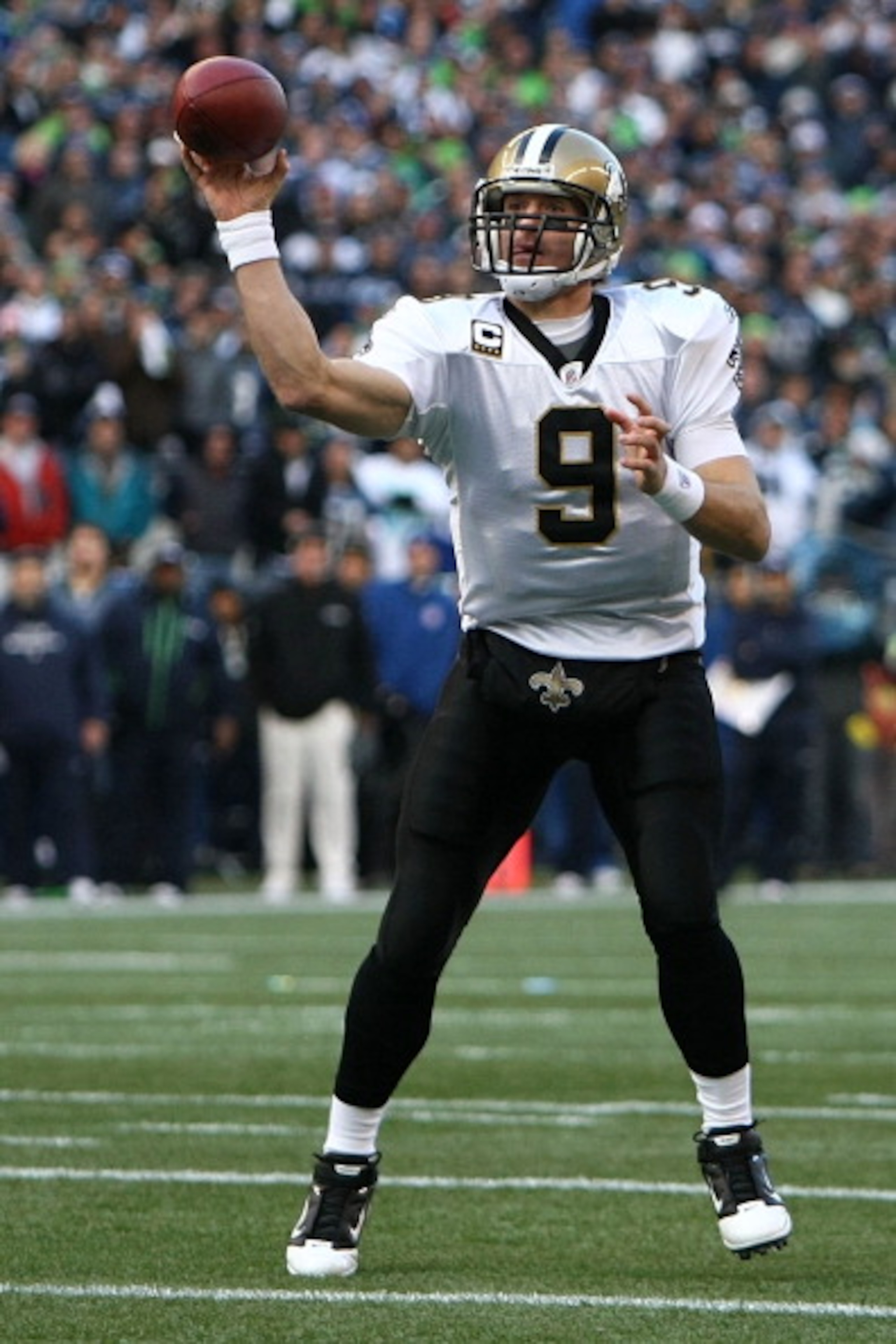 SEATTLE, WA - JANUARY 08:  Quarterback Drew Brees #9 of the New Orleans Saints throws a short pass that went incomplete in the first quarter against the Seattle Seahawks during the 2011 NFC wild-card playoff game at Qwest Field on January 8, 2011 in Seatt