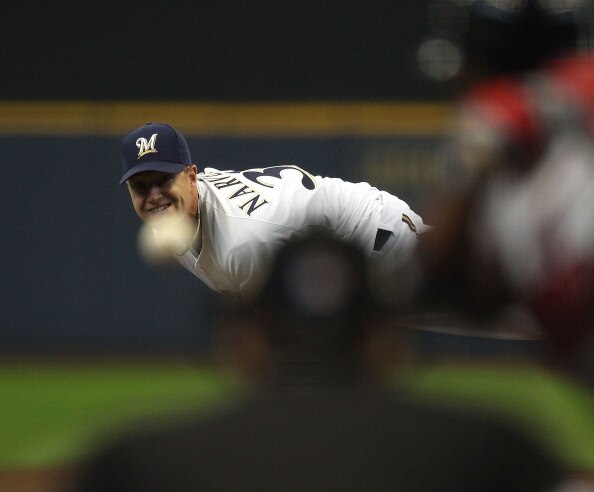 MILWAUKEE, WI - APRIL 04: Starting pitcher Chris Narveson #38 of the Milwaukee Brewers delivers the ball against the Atlanta Braves during the home opener at Miller Park on April 4, 2011 in Milwaukee, Wisconsin. The Braves defeated the Brewers 2-1.  (Phot