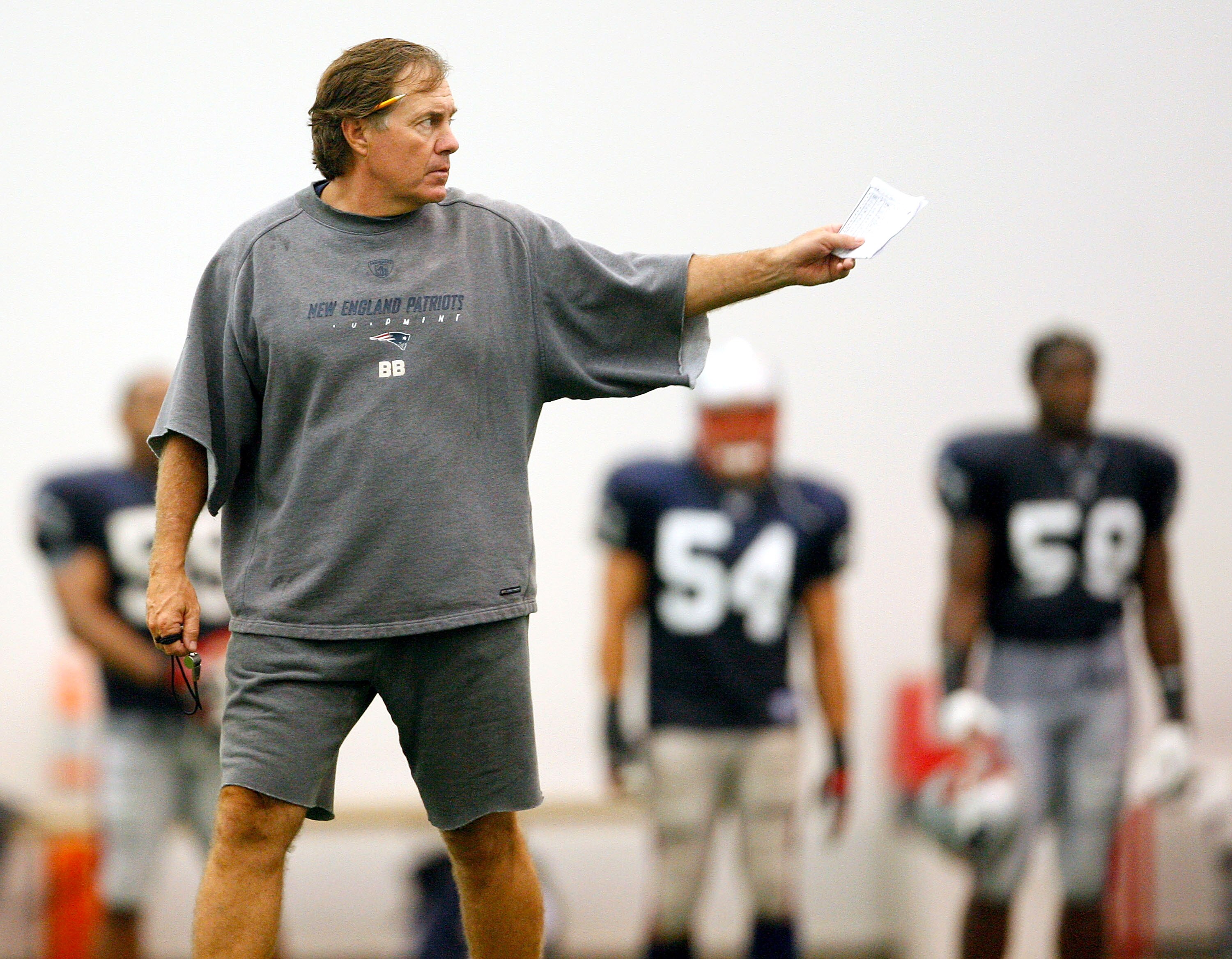FOXBORO, MA - JULY 24:  Coach Bill Belichick of the New England Patriots offers instruction during the first day of training camp at Gillette Stadium on July 24, 2008 in Foxboro, Massachusetts.  (Photo by Jim Rogash/Getty Images)