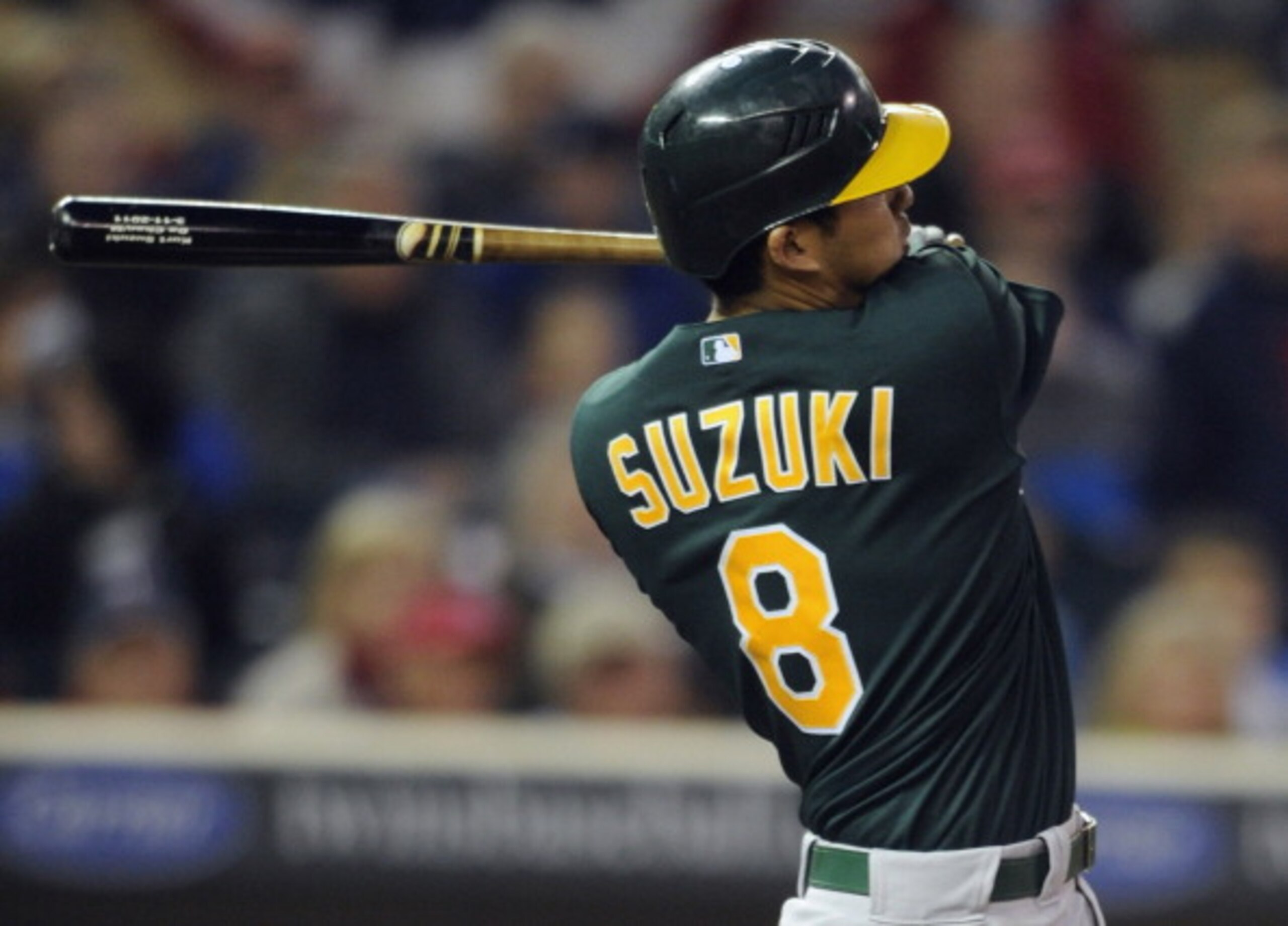 MINNEAPOLIS, MN - APRIL 9: Kurt Suzuki #8 of the Oakland Athletics singles against the Minnesota Twins during the sixth inning of their game on April 9, 2011 at Target Field in Minneapolis, Minnesota. Athletics defeated the Twins 1-0. (Photo by Hannah Fos