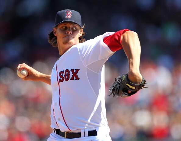 BOSTON, MA - APRIL 9:  Clay Buchholz #11 of the Boston Red Sox throws against the New York Yankees at Fenway Park April 9, 2011 in Boston, Massachusetts. (Photo by Jim Rogash/Getty Images)