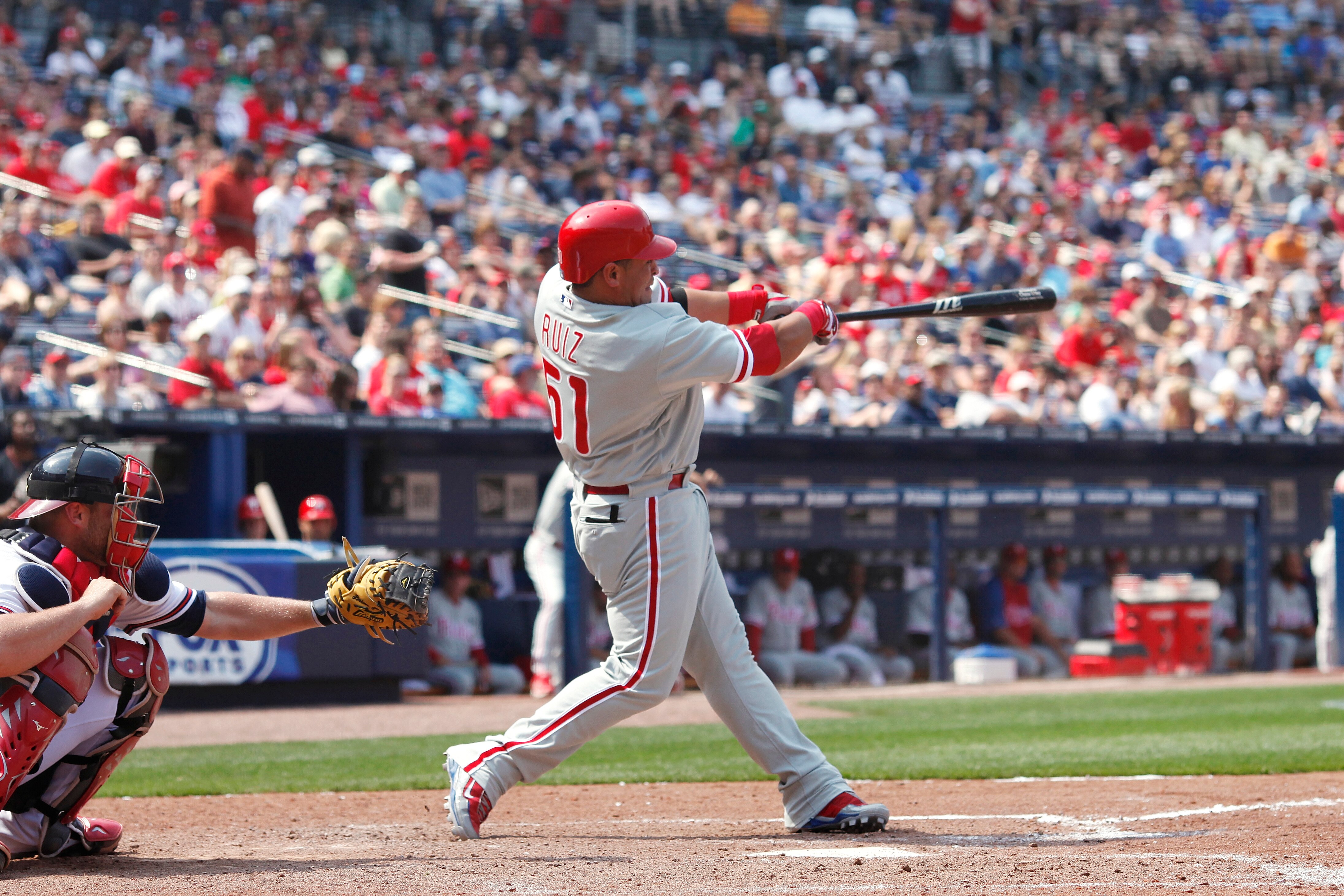 ATLANTA, GA - APRIL 9: Carlos Ruiz #51 of the Philadelphia Phillies drives in a run in the 8th inning with a double against the Atlanta Braves at Turner Field on April 9, 2011 in Atlanta, Georgia. The Phillies won 10-2. (Photo by Joe Robbins/Getty Images)