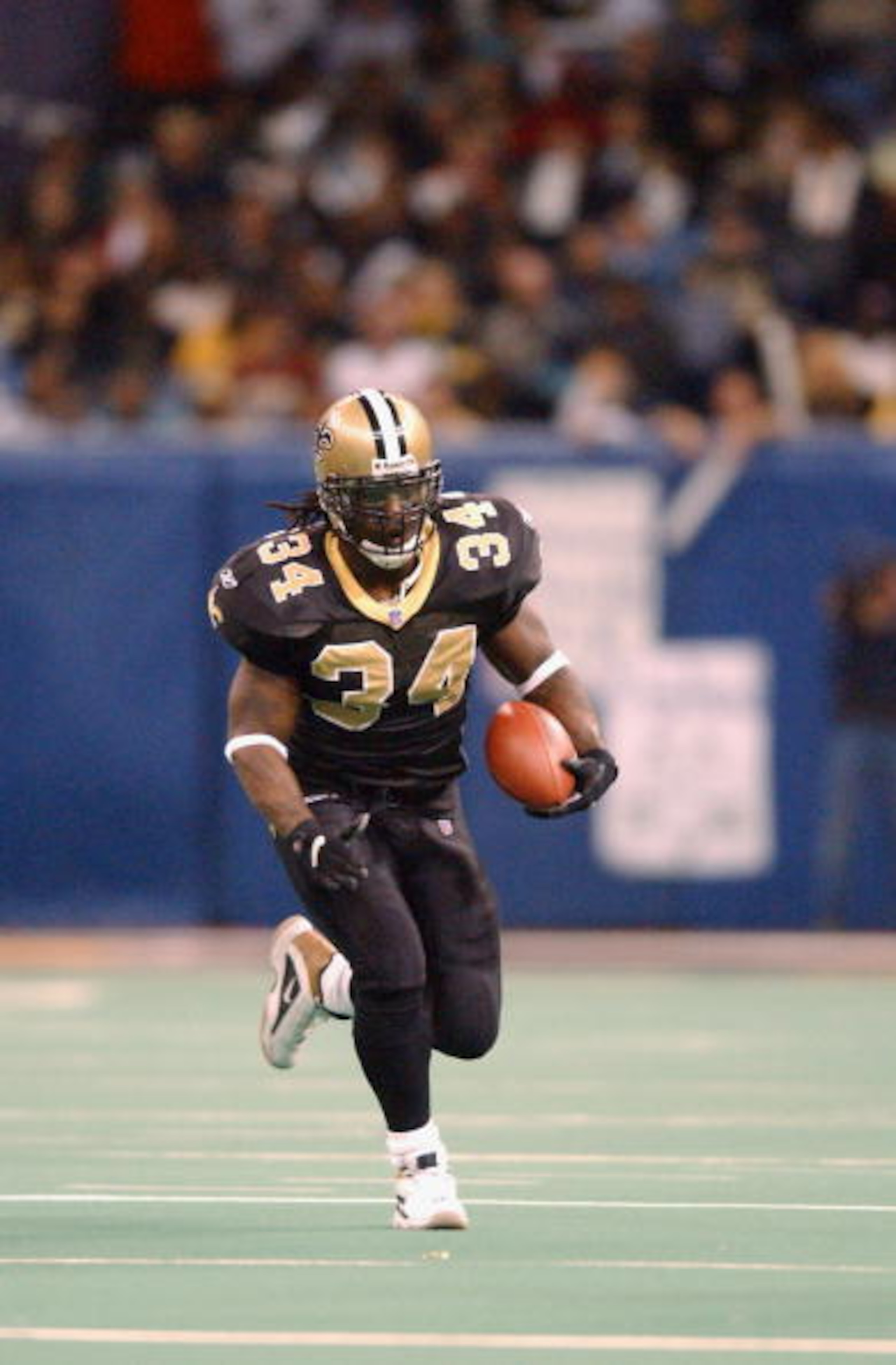 30 Dec 2001: Ricky Williams of the New Orleans Saints in action against the Washington Redskins during the game at the Superdome in New Orleans, Louisiana. The Redskins won 40-10. DIGITAL IMAGE. Mandatory Credit : Harry How/Getty Images 30 Dec 2001: Ricky Williams of the New Orleans Saints in action against the Washington Redskins during the game at the Superdome in New Orleans, Louisiana. The Redskins won 40-10. DIGITAL IMAGE. Mandatory Credit : Harry How/Getty Images
