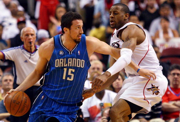 PHILADELPHIA - APRIL 26:  Andre Iguodala #9 of the Philadelphia 76ers defends against Hedo Turkoglu #15 of the Orlando Magic during Game Four of the Eastern Conference Quarterfinals during the 2009 NBA Playoffs at the Wachovia Center on April 26, 2009 in
