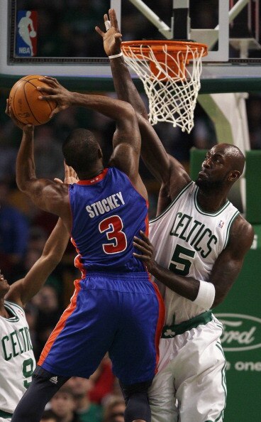 BOSTON, MA - JANUARY 19:  Kevin Garnett #5 of the Boston Celtics blocks as Rodney Stuckey #3 of the Detroit Pistons takes a shot on January 19, 2011 at the TD Garden in Boston, Massachusetts.  NOTE TO USER: User expressly acknowledges and agrees that, by