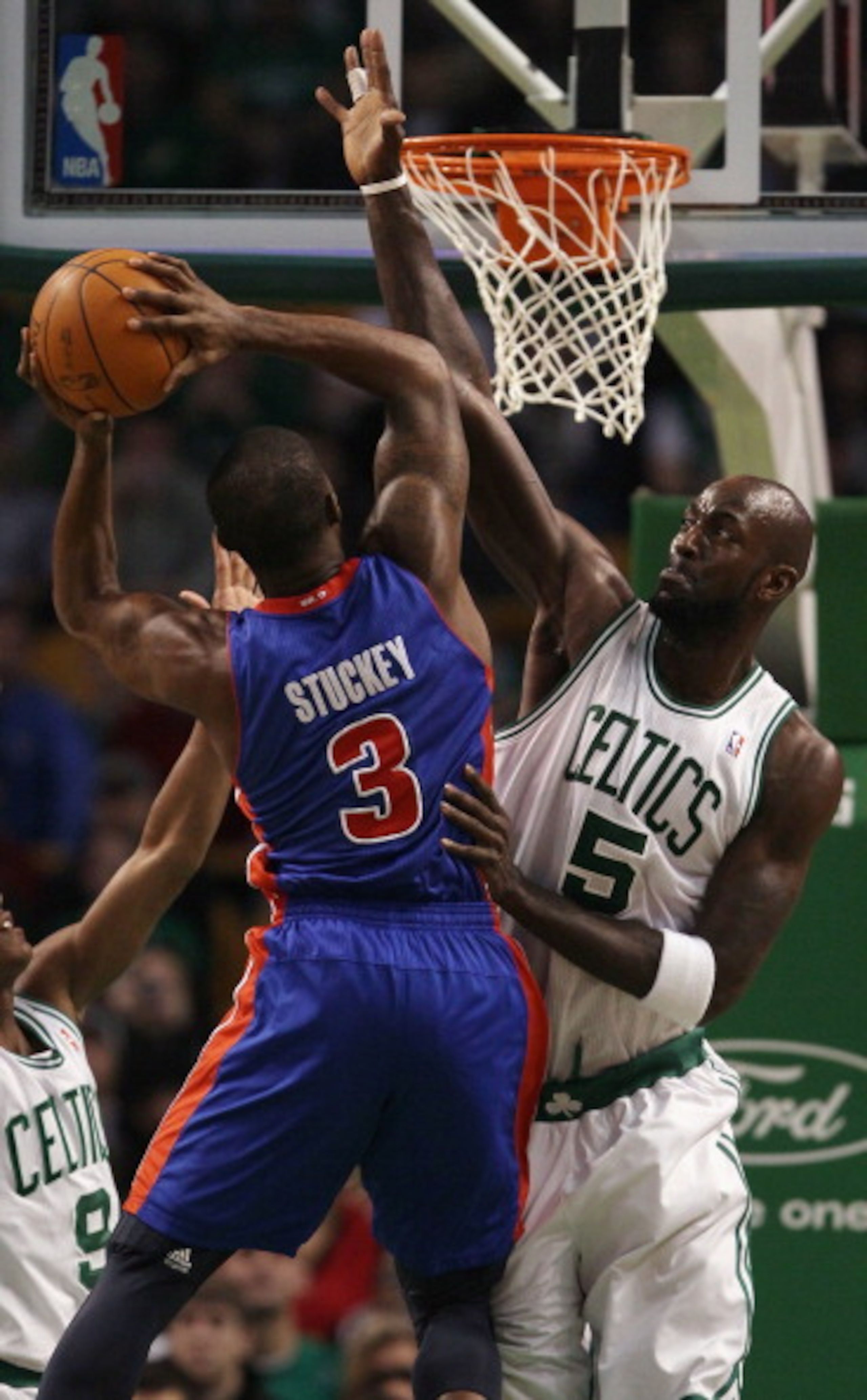 BOSTON, MA - JANUARY 19:  Kevin Garnett #5 of the Boston Celtics blocks as Rodney Stuckey #3 of the Detroit Pistons takes a shot on January 19, 2011 at the TD Garden in Boston, Massachusetts.  NOTE TO USER: User expressly acknowledges and agrees that, by