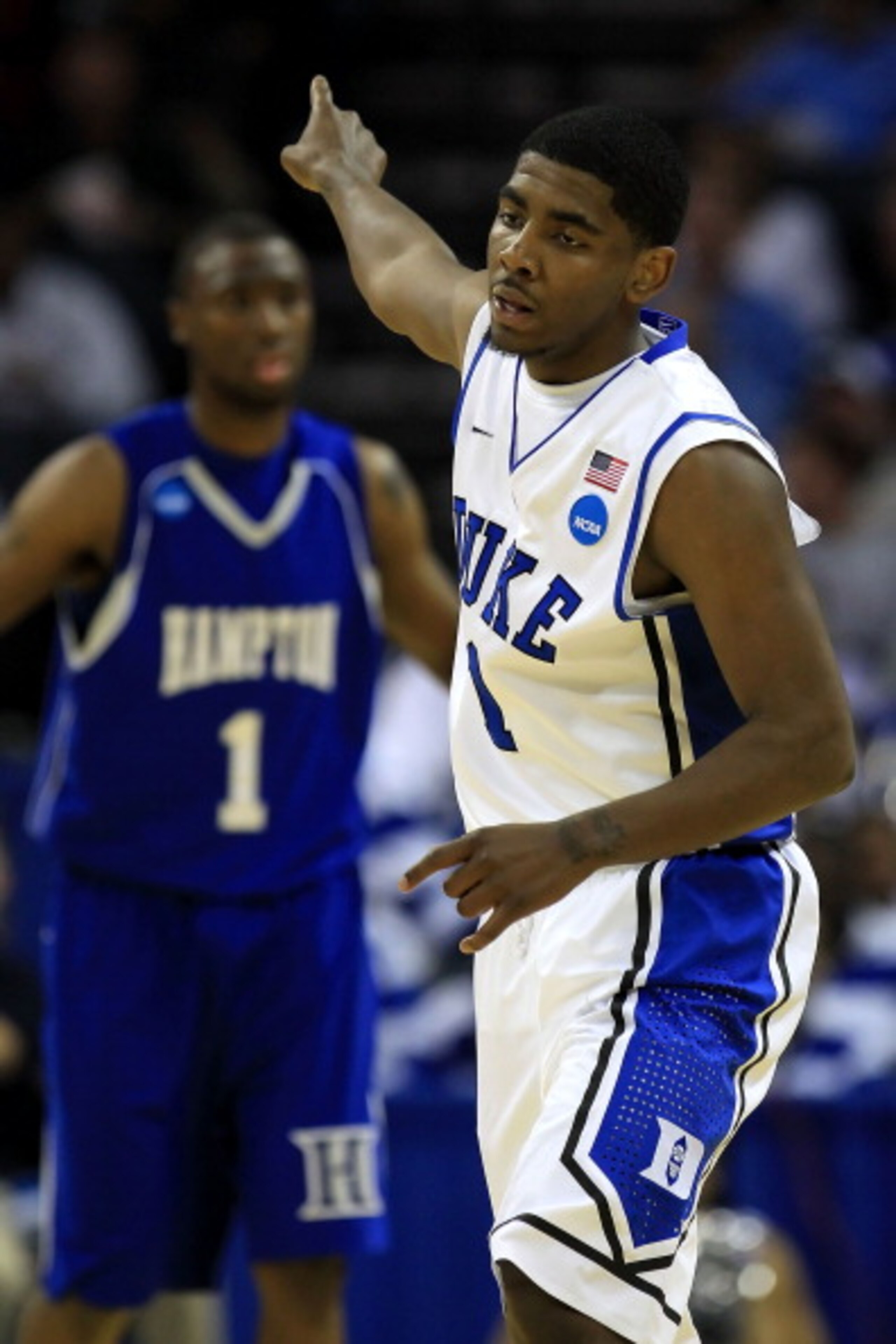 CHARLOTTE, NC - MARCH 18:  Kyrie Irving #1 of the Duke Blue Devils reacts in the first half while taking on the Hampton Pirates during the second round of the 2011 NCAA men's basketball tournament at Time Warner Cable Arena on March 18, 2011 in Charlotte,