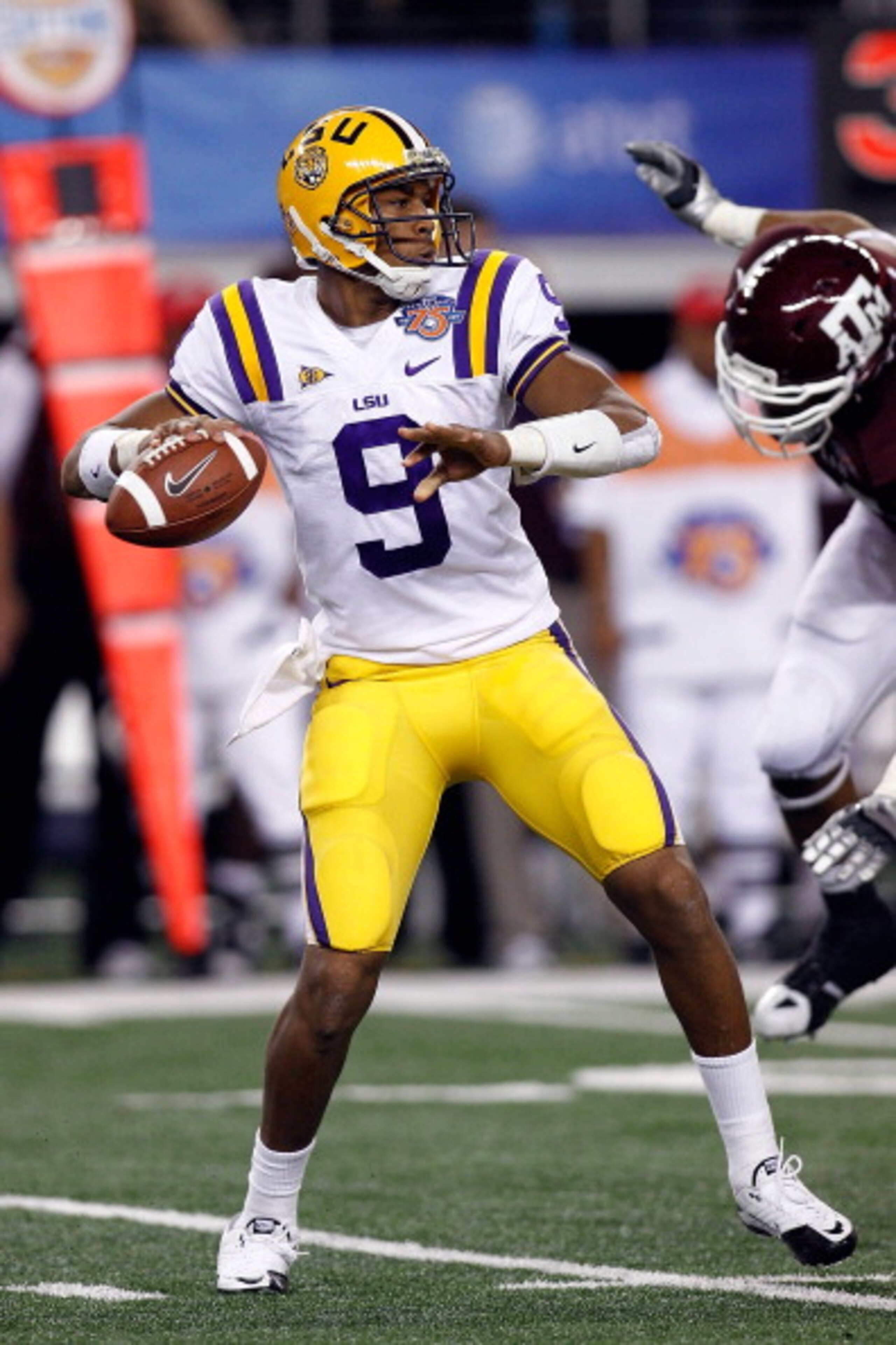 ARLINGTON, TX - JANUARY 07:  Jordan Jefferson #9 of the Louisiana State University Tigers looks to throw a pass during the game against the Texas A&M Aggies during the AT&T Cotton Bowl at Cowboys Stadium on January 7, 2011 in Arlington, Texas.  (Photo by