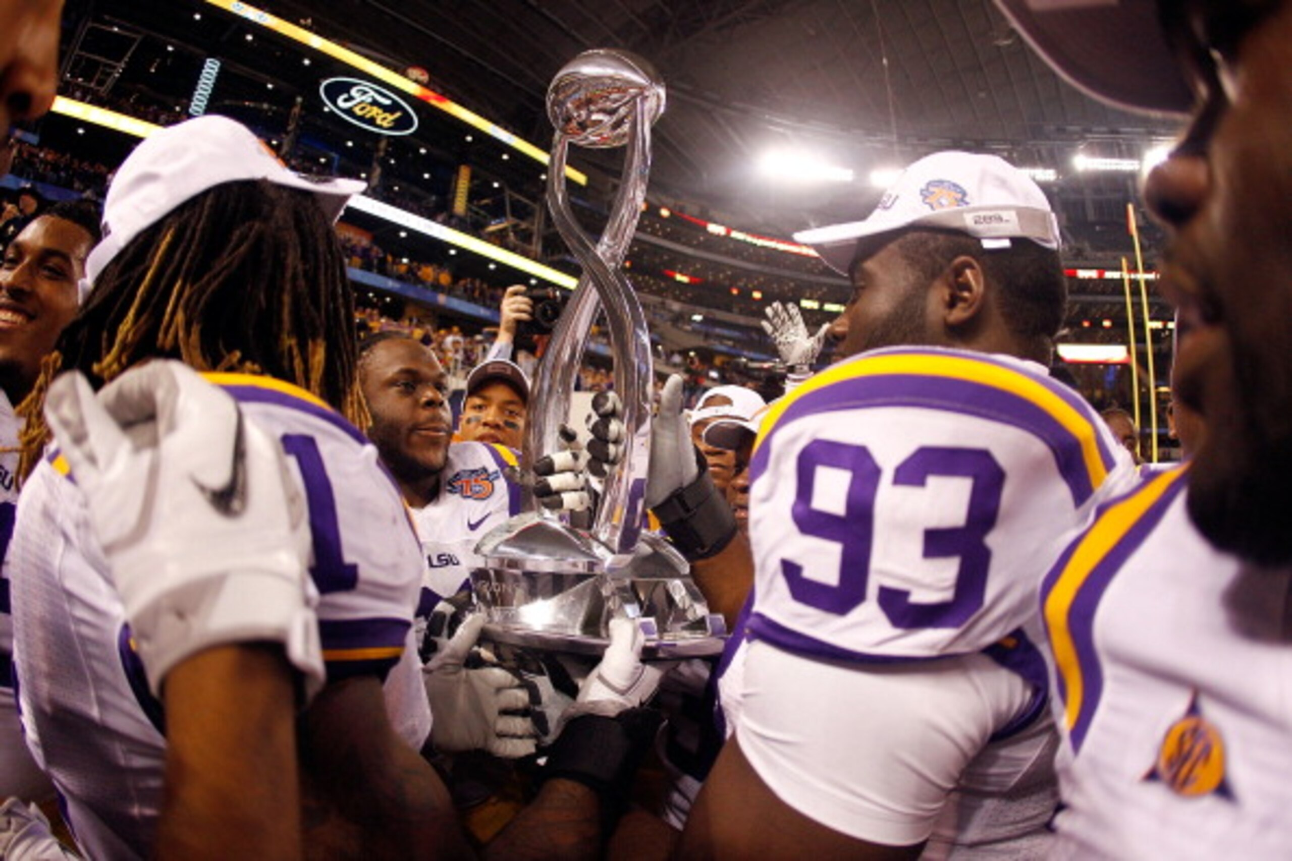 ARLINGTON, TX - JANUARY 07:  Members of the Louisiana State University Tigers celebrate after defeating the Texas A&M Aggies 41-24 during the AT&T Cotton Bowl at Cowboys Stadium on January 7, 2011 in Arlington, Texas.  (Photo by Chris Graythen/Getty Image