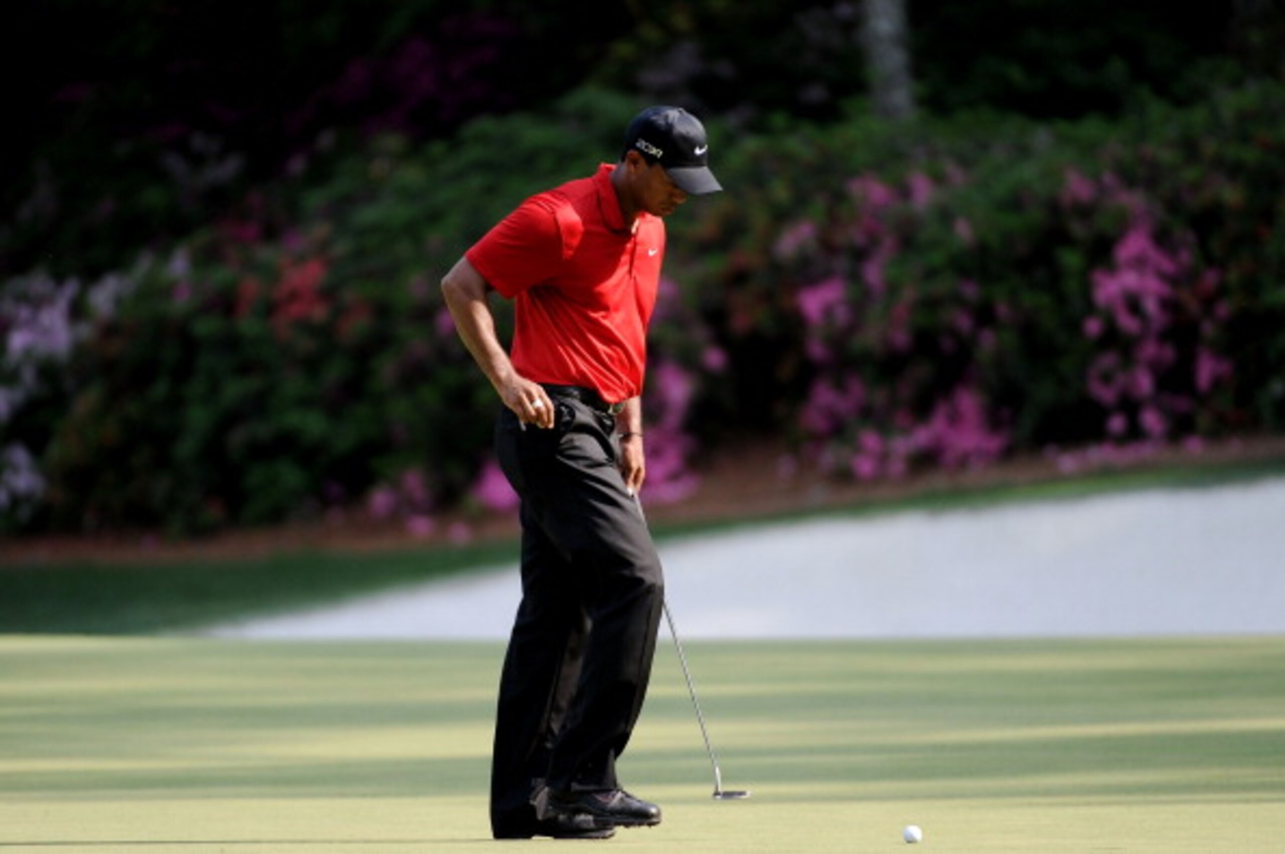 AUGUSTA, GA - APRIL 10: Tiger Woods reacts to a missed putt on the 13th green during the final round of the 2011 Masters Tournament at Augusta National Golf Club on April 10, 2011 in Augusta, Georgia. (Photo by Harry How/Getty Images) AUGUSTA, GA - APRIL 10: Tiger Woods reacts to a missed putt on the 13th green during the final round of the 2011 Masters Tournament at Augusta National Golf Club on April 10, 2011 in Augusta, Georgia. (Photo by Harry How/Getty Images)