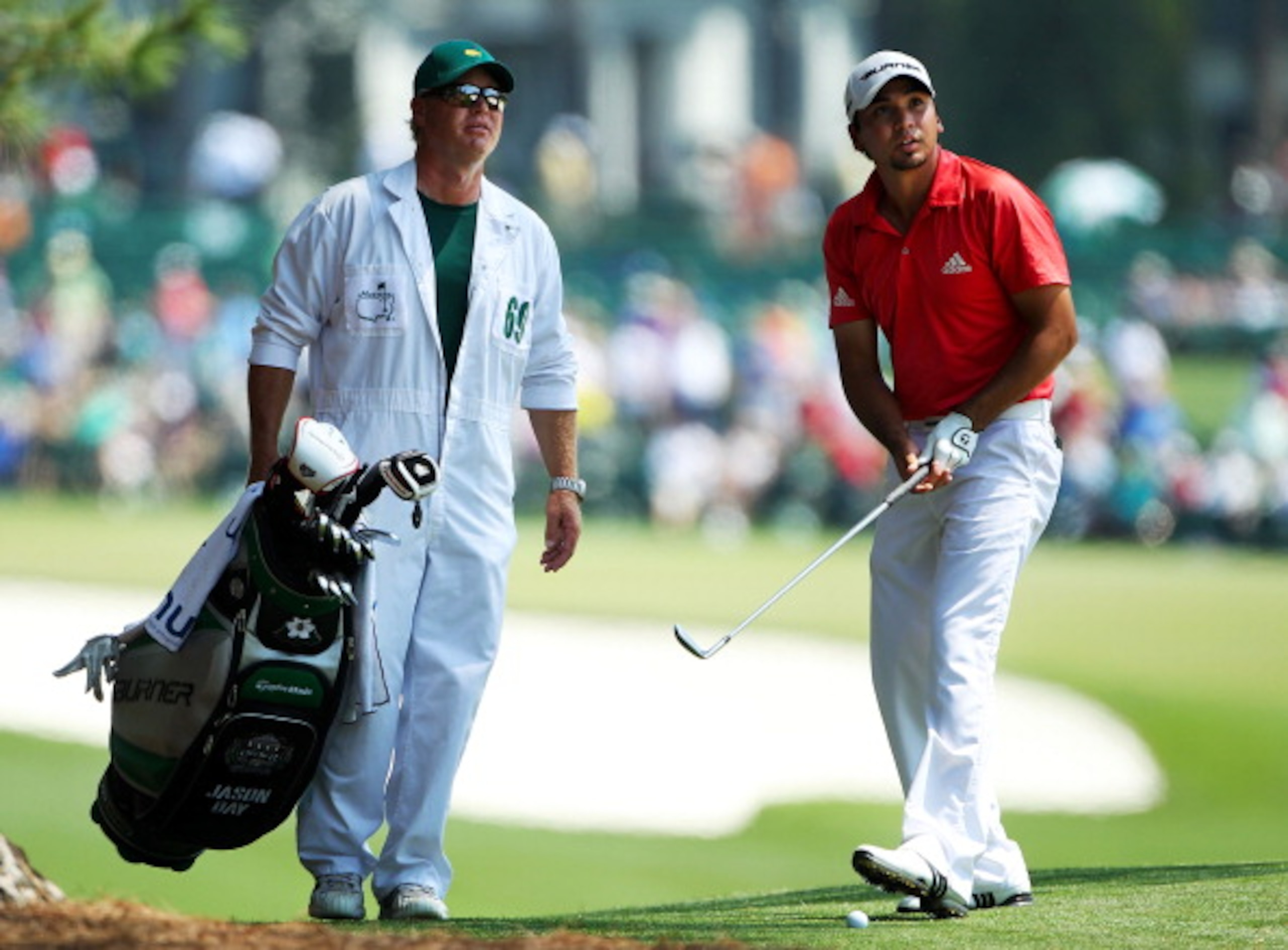 AUGUSTA, GA - APRIL 10: Jason Day of Australia chats with his caddie Colin Swatton on the first hole during the final round of the 2011 Masters Tournament at Augusta National Golf Club on April 10, 2011 in Augusta, Georgia. (Photo by Jamie Squire/Getty AUGUSTA, GA - APRIL 10: Jason Day of Australia chats with his caddie Colin Swatton on the first hole during the final round of the 2011 Masters Tournament at Augusta National Golf Club on April 10, 2011 in Augusta, Georgia. (Photo by Jamie Squire/Getty