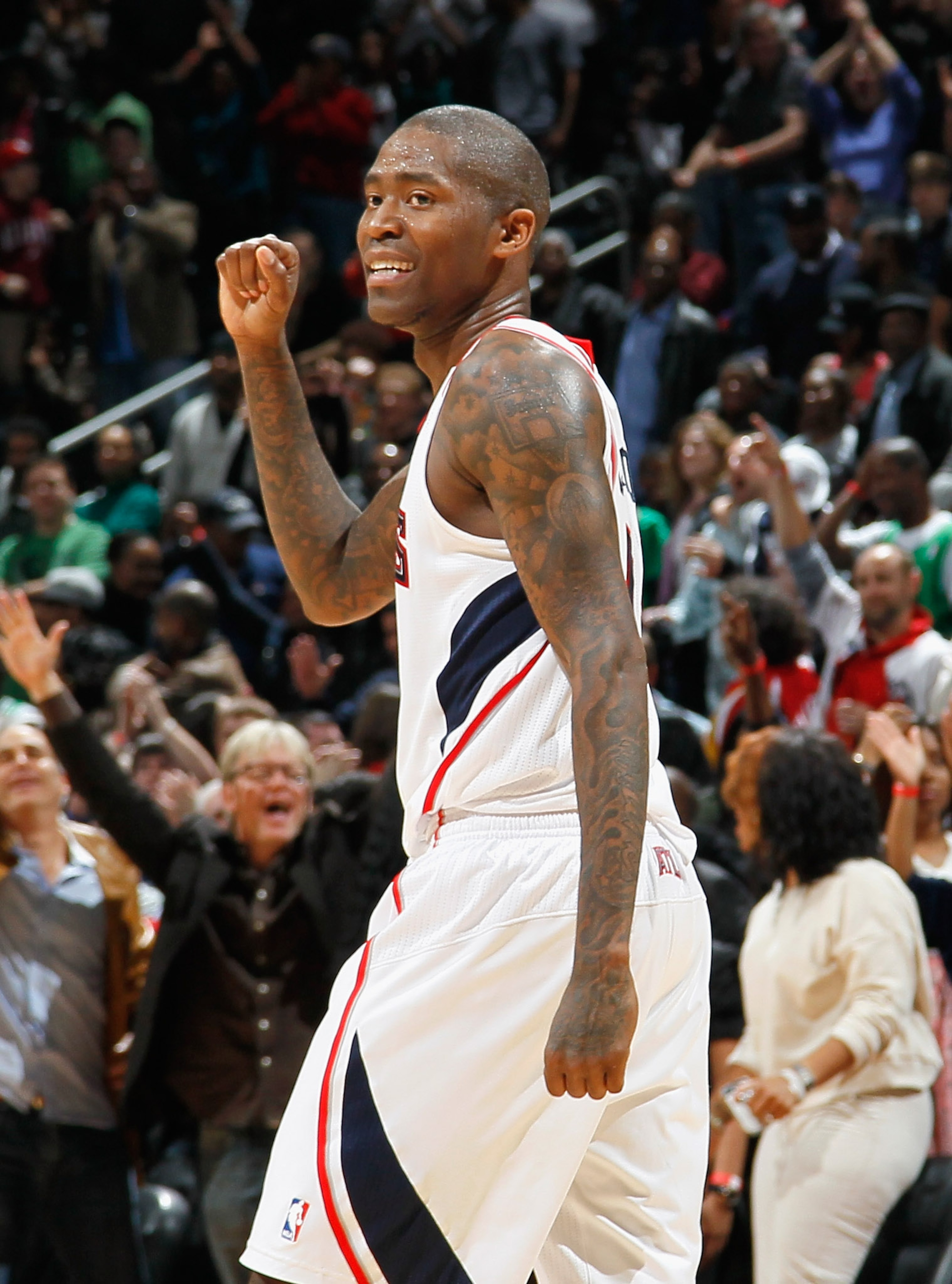 ATLANTA, GA - APRIL 01:  Jamal Crawford #11 of the Atlanta Hawks reacts after a basket against the Boston Celtics at Philips Arena on April 1, 2011 in Atlanta, Georgia.  NOTE TO USER: User expressly acknowledges and agrees that, by downloading and/or usin