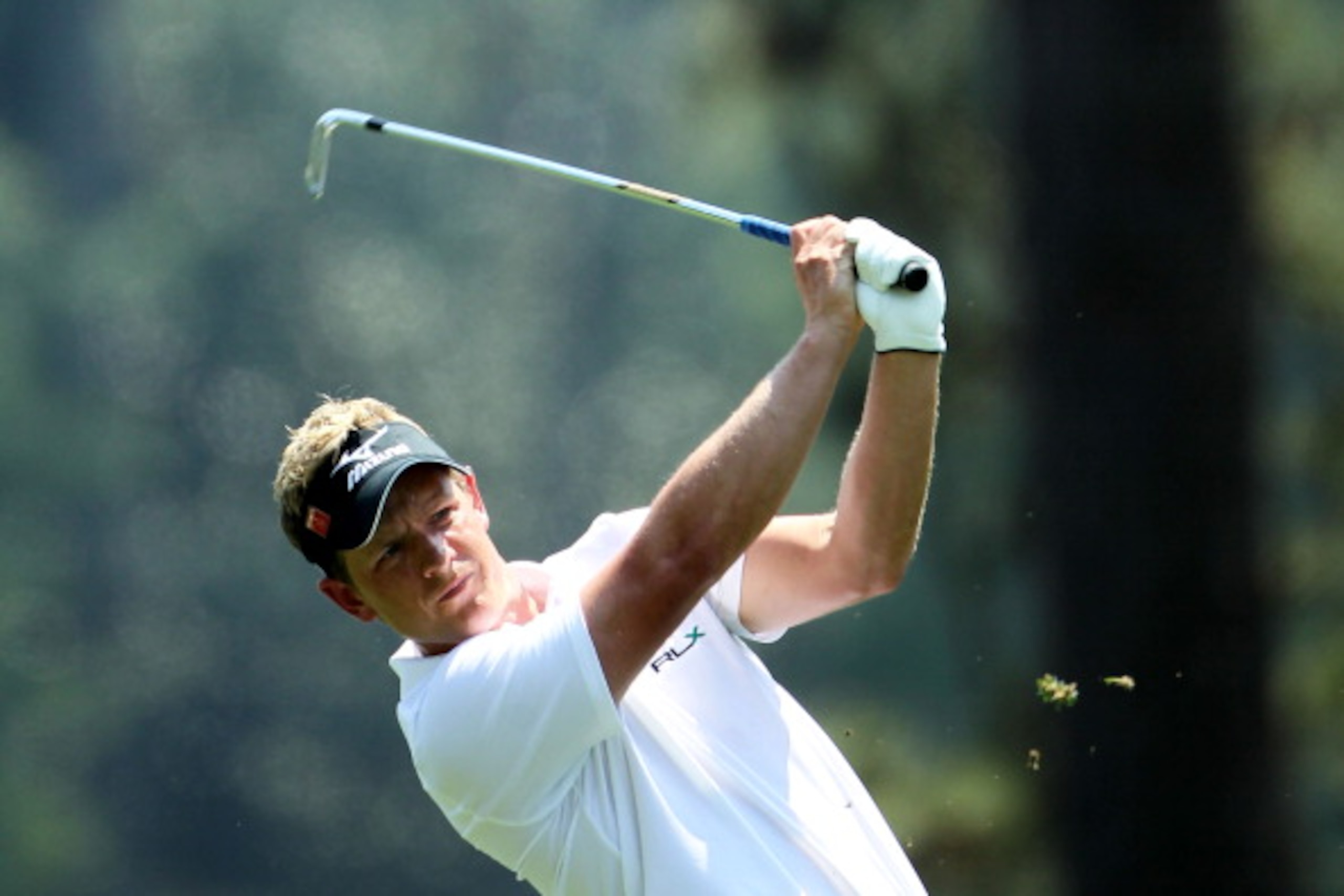 AUGUSTA, GA - APRIL 10: Luke Donald of England hits his approach shot on the first hole during the final round of the 2011 Masters Tournament at Augusta National Golf Club on April 10, 2011 in Augusta, Georgia. (Photo by Jamie Squire/Getty Images) AUGUSTA, GA - APRIL 10: Luke Donald of England hits his approach shot on the first hole during the final round of the 2011 Masters Tournament at Augusta National Golf Club on April 10, 2011 in Augusta, Georgia. (Photo by Jamie Squire/Getty Images)