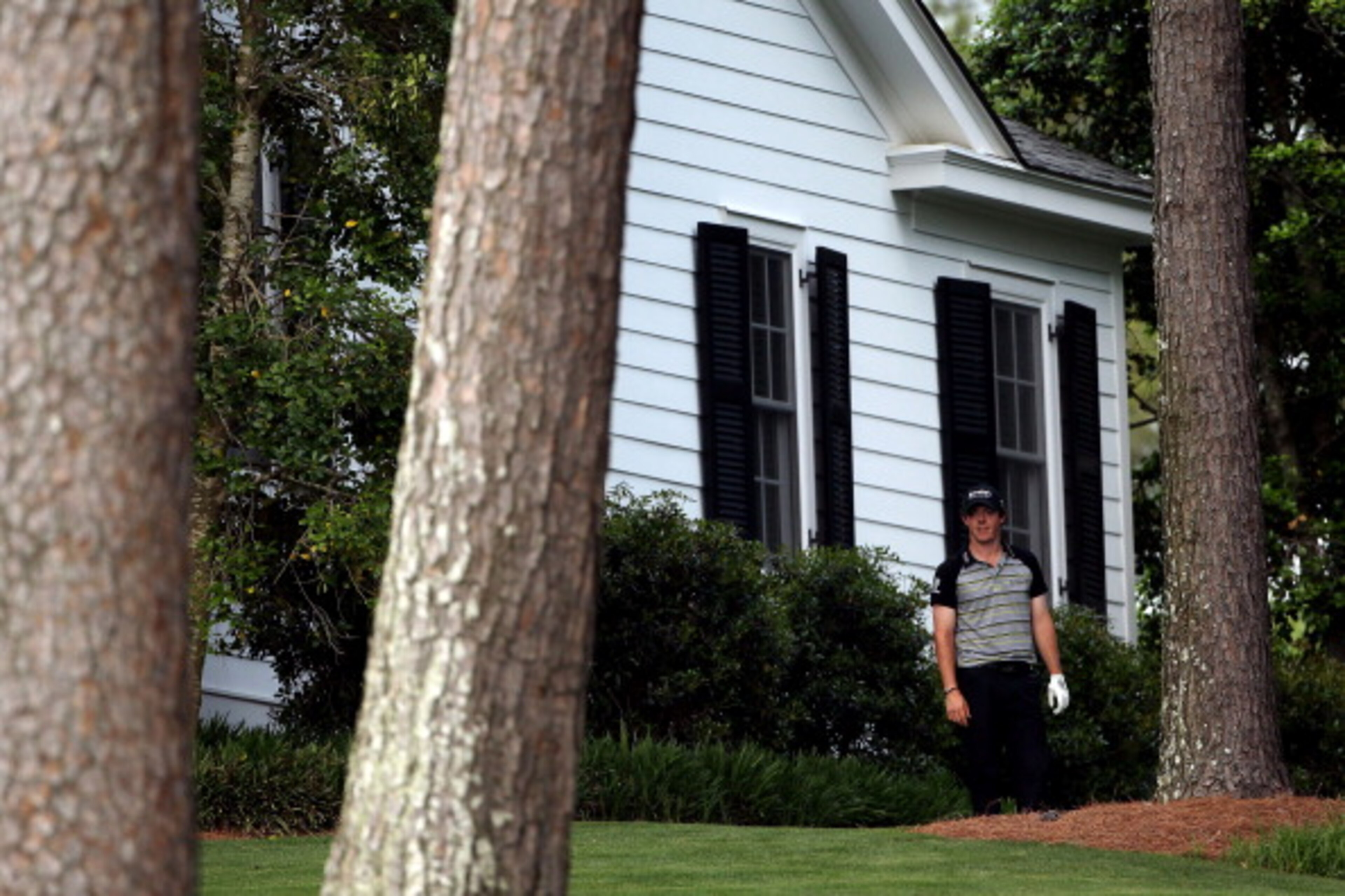 AUGUSTA, GA - APRIL 10: Rory McIlroy of Northern Ireland waits on the tenth hole after an errant tee shot during the final round of the 2011 Masters Tournament at Augusta National Golf Club on April 10, 2011 in Augusta, Georgia. (Photo by Andrew Redingt AUGUSTA, GA - APRIL 10: Rory McIlroy of Northern Ireland waits on the tenth hole after an errant tee shot during the final round of the 2011 Masters Tournament at Augusta National Golf Club on April 10, 2011 in Augusta, Georgia. (Photo by Andrew Redingt