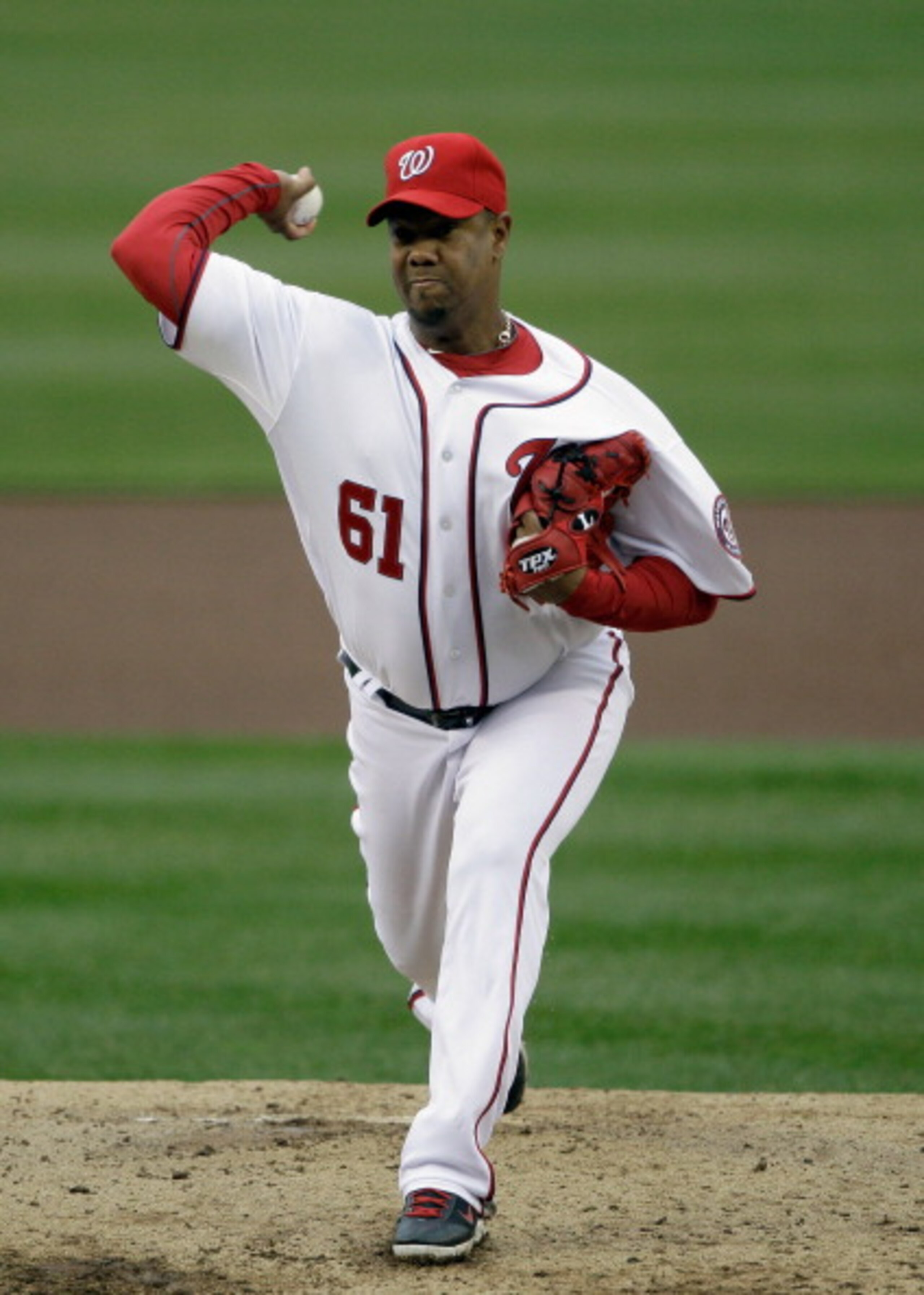 WASHINGTON, DC - MARCH 31:  Starting pitcher Livan Hernandez #61 of the Washington Nationalsagainst the Atlanta Braves at Nationals Park on March 31, 2011 in Washington, DC.  (Photo by Rob Carr/Getty Images)
