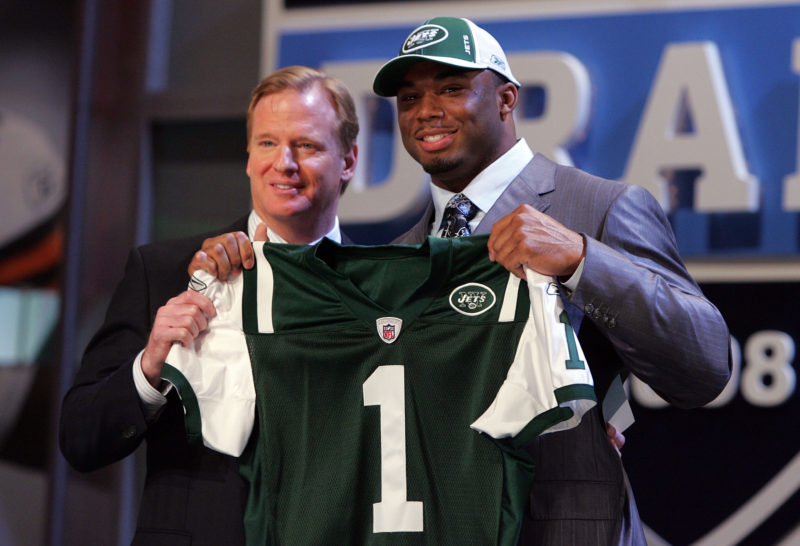 NEW YORK - APRIL 26: Vernon Gholston poses for a photo after being selected as the sixth overall pick by the New York Jets with National Football League Commissioner Roger Goodell during the 2008 NFL Draft on April 26, 2008 at Radio City Music Hall in Ap NEW YORK - APRIL 26: Vernon Gholston poses for a photo after being selected as the sixth overall pick by the New York Jets with National Football League Commissioner Roger Goodell during the 2008 NFL Draft on April 26, 2008 at Radio City Music Hall in Ap