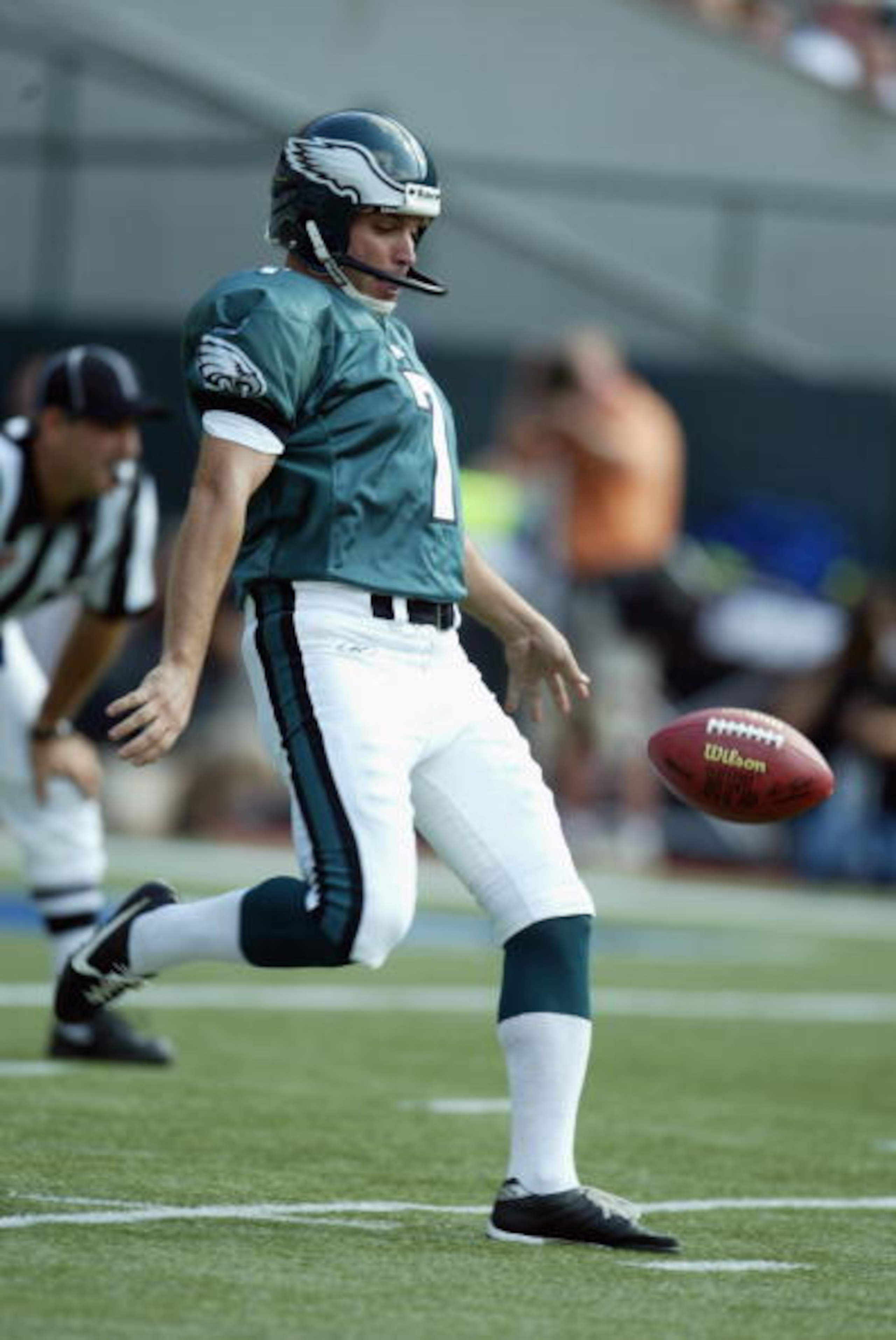 PHILADELPHIA - SEPTEMBER 29:  Punter Sean Landeta #7 of the Philadelphia Eagles drop kicks the ball during the NFL game against the Houston Texans on September 29, 2002 at Veterens Stadium in Philadelphia, Pennsylvania.  The Eagles won 35-17.  (Photo by A