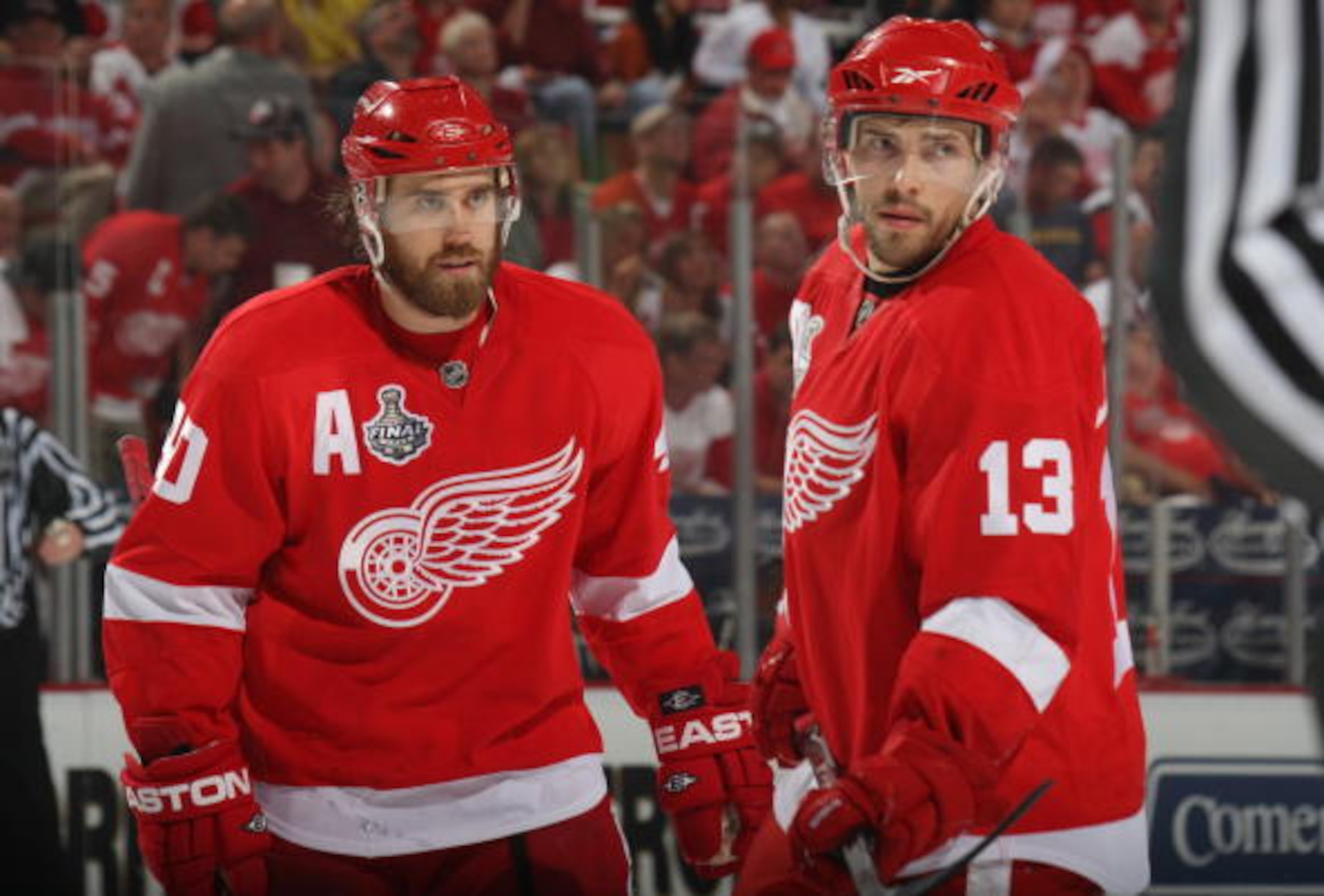 DETROIT - JUNE 6: Henrik Zetterberg #40 and Pavel Datsyuk #13 of the Detroit Red Wings look on against the Pittsburgh Penguins during Game Five of the 2009 NHL Stanley Cup Finals at Joe Louis Arena on June 6, 2009 in Detroit, Michigan. (Photo by: Bruce B DETROIT - JUNE 6: Henrik Zetterberg #40 and Pavel Datsyuk #13 of the Detroit Red Wings look on against the Pittsburgh Penguins during Game Five of the 2009 NHL Stanley Cup Finals at Joe Louis Arena on June 6, 2009 in Detroit, Michigan. (Photo by: Bruce B