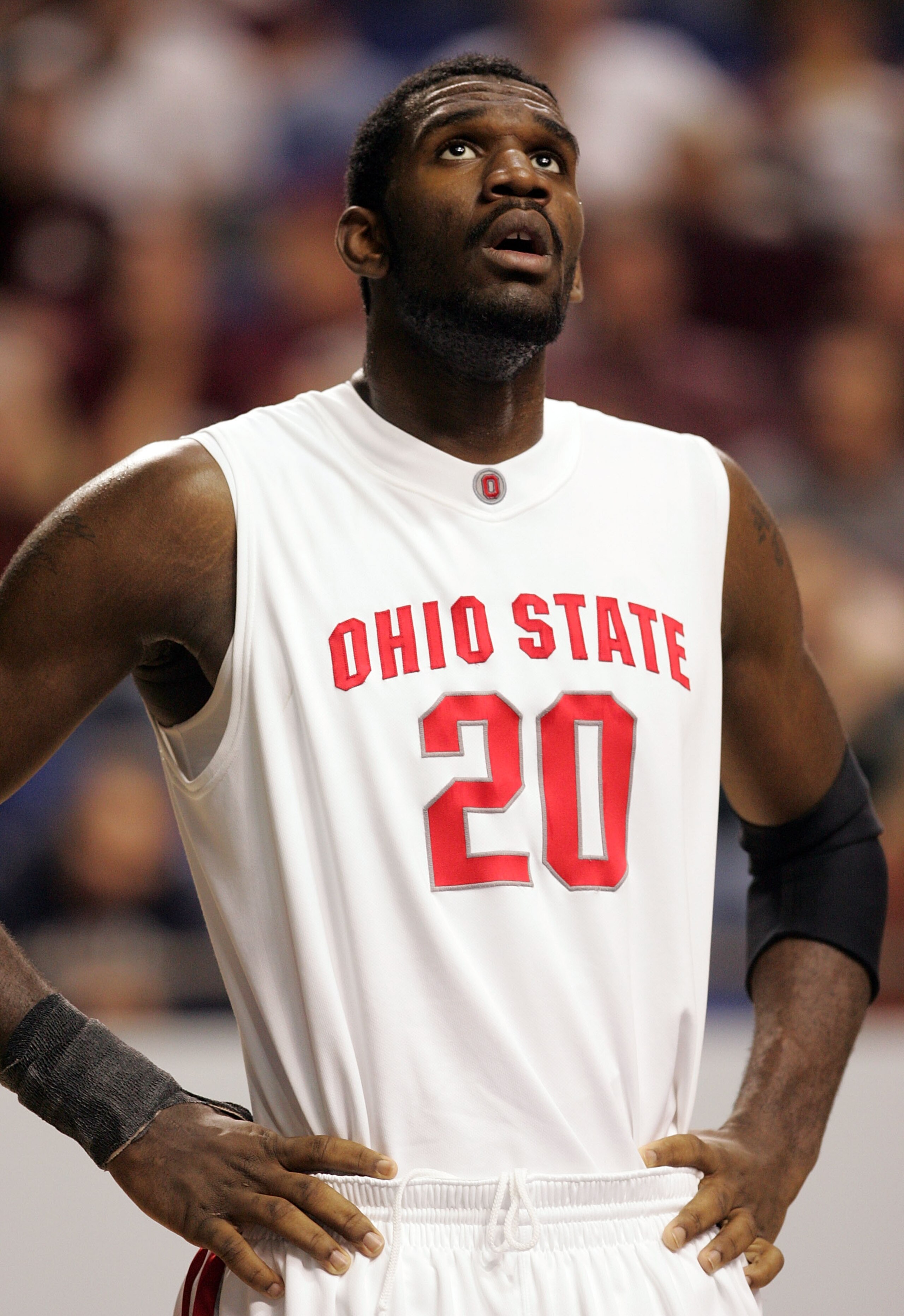 LEXINGTON, KY - MARCH 17:  Greg Oden #20 of the Ohio State Buckeyes looks on during their game against the Xavier Musketeers in round two of the NCAA Men's Basketball Tournament at Rupp Arena on March 17, 2007 in Lexington, Kentucky.  (Photo by Andy Lyons