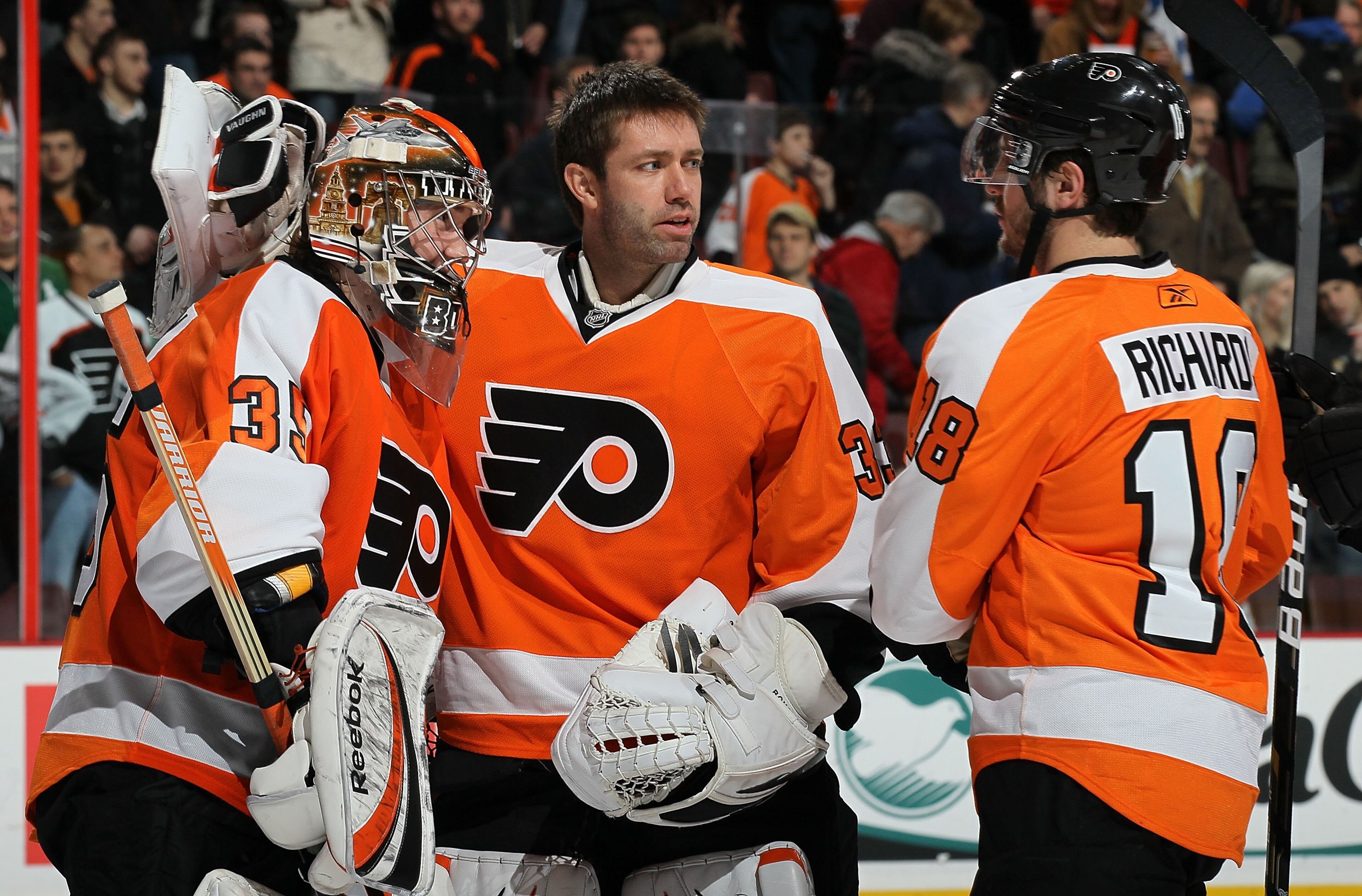 PHILADELPHIA, PA - JANUARY 20: Sergei Bobrovsky #35, Brian Boucher #33 and Mike Richards #18 of the Philadelphia Flyers celebrate against the Ottawa Senators on January 20, 2011 at Wells Fargo Center in Philadelphia, Pennsylvania. (Photo by Jim McIsaac/ PHILADELPHIA, PA - JANUARY 20: Sergei Bobrovsky #35, Brian Boucher #33 and Mike Richards #18 of the Philadelphia Flyers celebrate against the Ottawa Senators on January 20, 2011 at Wells Fargo Center in Philadelphia, Pennsylvania. (Photo by Jim McIsaac/