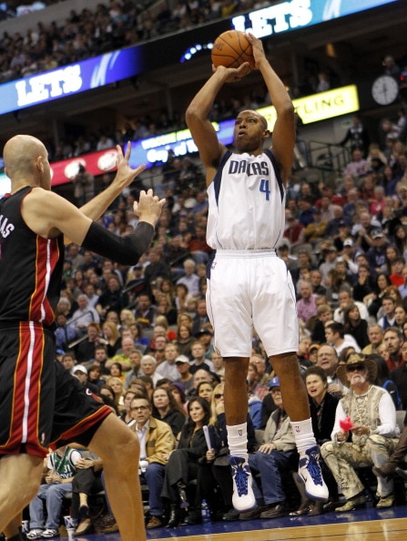 DALLAS - NOVEMBER 27: Caron Butler #4 of the Dallas Mavericks shoots over Zydrunas IIgauskas #11 of the Miami Heat on November 27, 2010 at the American Airlines Center in Dallas, Texas. NOTE TO USER: User expressly acknowledges and agrees that, by downloa