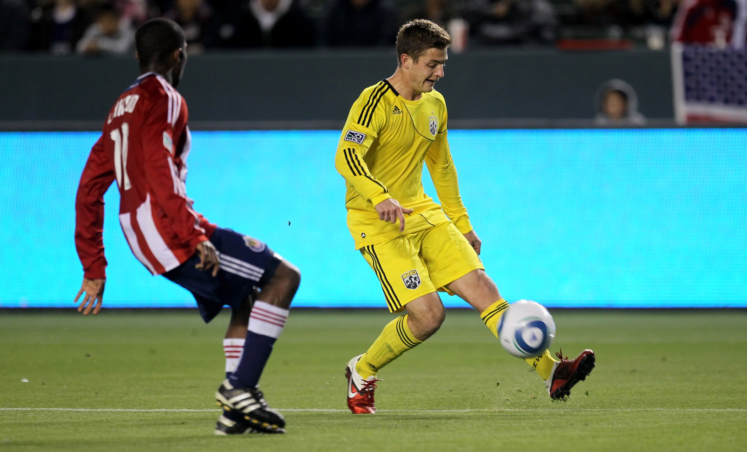 CARSON, CA - APRIL 9:   Robbie Rogers #18 of the Columbus Crew controls the ball against Michael Lahoud #11 of Chivas USA at The Home Depot Center on April 9, 2011 in Carson, California.  The game ended in a 0-0 tie.  (Photo by Stephen Dunn/Getty Images)