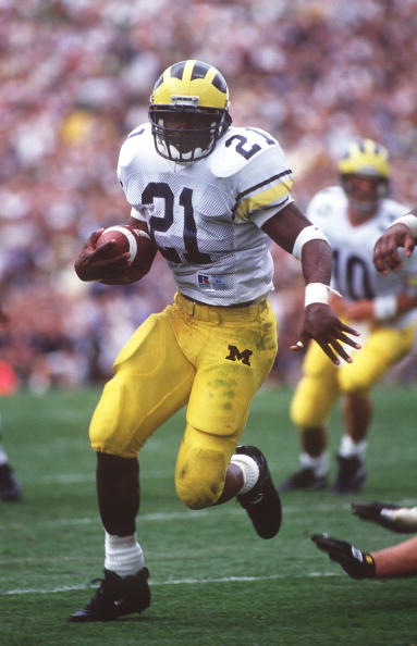 10 SEP 1994:  MICHIGAN RUNNING BACK TIM BIAKABUTUKA CARRIES THE FOOTBALL DURING THE WOLVERINES 26-24 VICTORY OVER THE FIGHTING IRISH AT NOTRE DAME STADIUM IN SOUTH BEND, INDIANA. Mandatory Credit: Gary Mook/ALLSPORT