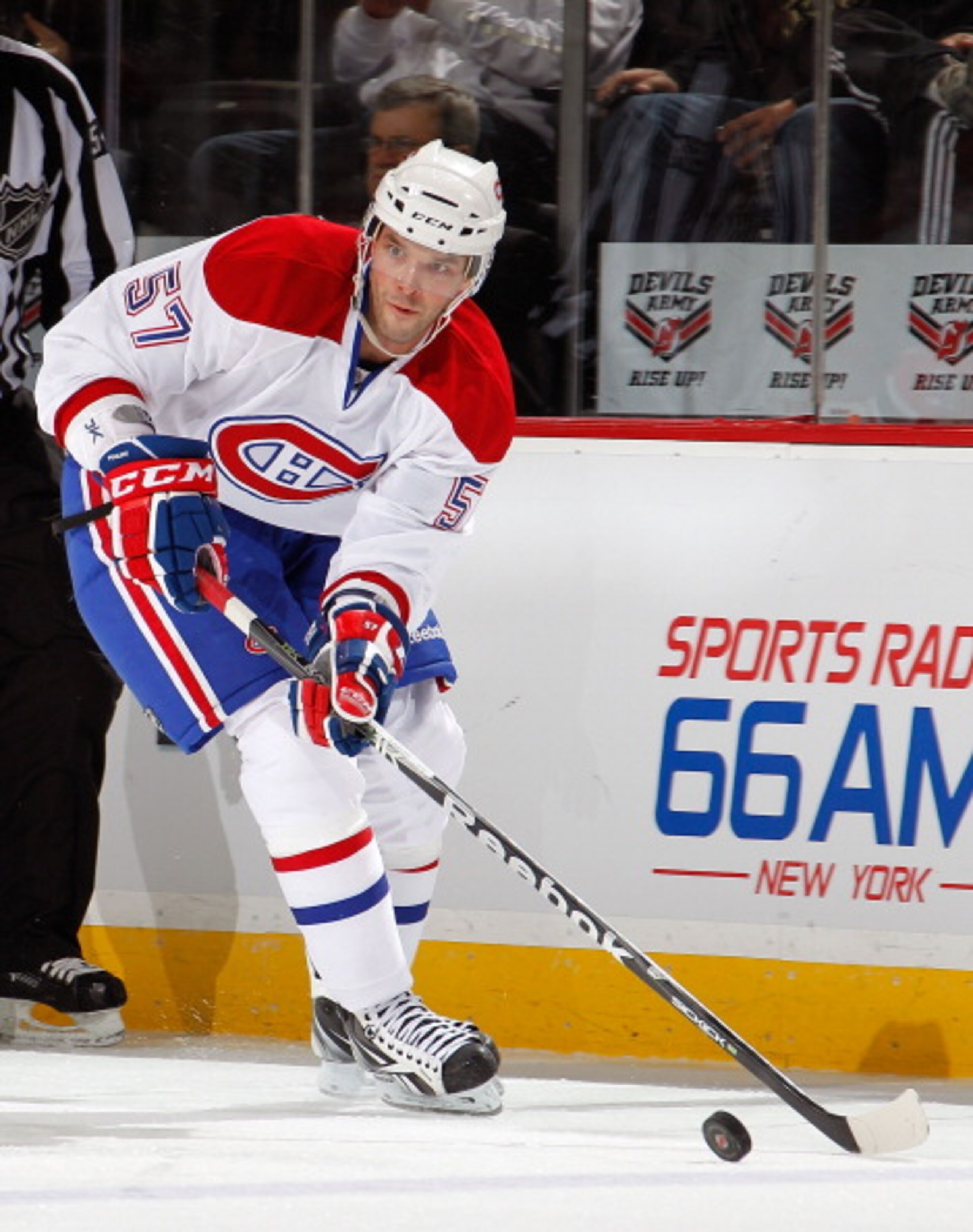 NEWARK, NJ - APRIL 02:  Benoit Pouliot #57 of the Montreal Canadians skates during an NHL hockey game against the New Jersey Devils at the Prudential Center on April 2, 2011 in Newark, New Jersey.  (Photo by Paul Bereswill/Getty Images)