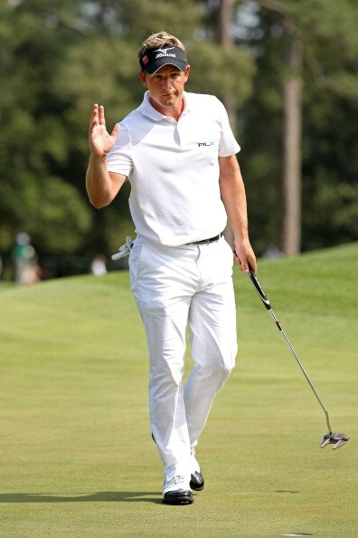 AUGUSTA, GA - APRIL 10:  Luke Donald of England waves to the gallery on the eighth green during the final round of the 2011 Masters Tournament at Augusta National Golf Club on April 10, 2011 in Augusta, Georgia.  (Photo by Andrew Redington/Getty Images)