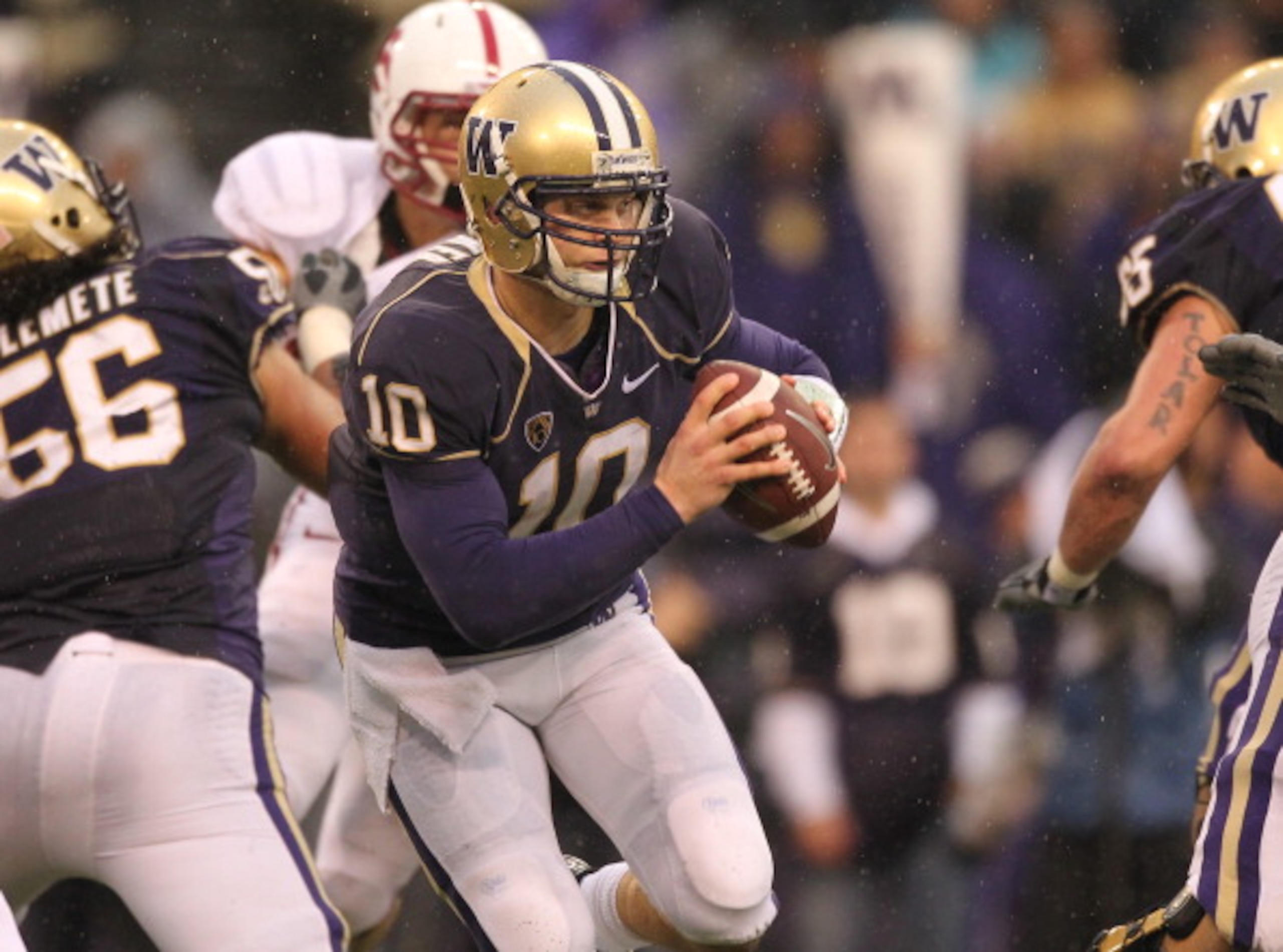 SEATTLE - OCTOBER 30: Quarterback Jake Locker #10 of the Washington Huskies scrambles against the Stanford Cardinal on October 30, 2010 at Husky Stadium in Seattle, Washington. Stanford won 41-0. (Photo by Otto Greule Jr/Getty Images) SEATTLE - OCTOBER 30: Quarterback Jake Locker #10 of the Washington Huskies scrambles against the Stanford Cardinal on October 30, 2010 at Husky Stadium in Seattle, Washington. Stanford won 41-0. (Photo by Otto Greule Jr/Getty Images)