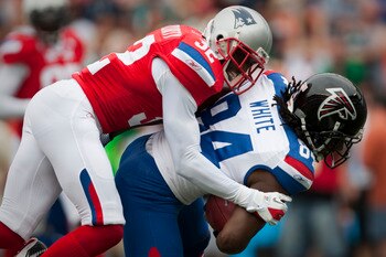 HONOLULU - JANUARY 30: Devin McCourty, #32 of the New England Patriots, tackles Roddy White, #84 of the Atlanta Falcons, during the 2011 NFL Pro Bowl at Aloha Stadium on January 30, 2011 in Honolulu, Hawaii. (Photo by Kent Nishimura/Getty Images) HONOLULU - JANUARY 30: Devin McCourty, #32 of the New England Patriots, tackles Roddy White, #84 of the Atlanta Falcons, during the 2011 NFL Pro Bowl at Aloha Stadium on January 30, 2011 in Honolulu, Hawaii. (Photo by Kent Nishimura/Getty Images)