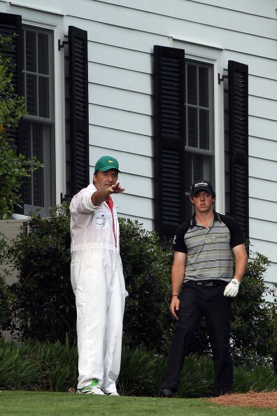 AUGUSTA, GA - APRIL 10:  Rory McIlroy of Northern Ireland waits to plays a shot on the tenth hole as his caddie J.P. Fitzgerald looks on during the final round of the 2011 Masters Tournament at Augusta National Golf Club on April 10, 2011 in Augusta, Geor