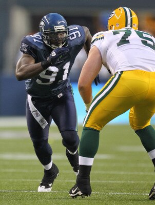 SEATTLE - AUGUST 21: Defensive end Chris Clemons #91 of the Seattle Seahawks battles Bryan Bulaga #75 during the preseason game against the Green Bay Packers at Qwest Field on August 21, 2010 in Seattle, Washington. (Photo by Otto Greule Jr/Getty Images) SEATTLE - AUGUST 21: Defensive end Chris Clemons #91 of the Seattle Seahawks battles Bryan Bulaga #75 during the preseason game against the Green Bay Packers at Qwest Field on August 21, 2010 in Seattle, Washington. (Photo by Otto Greule Jr/Getty Images)