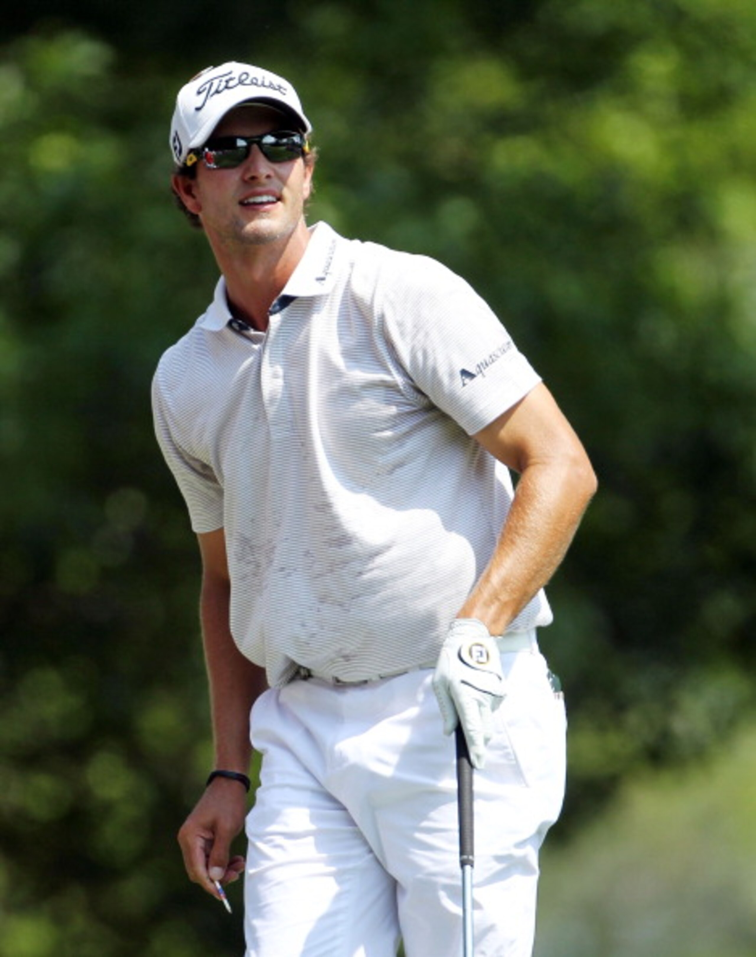 AUGUSTA, GA - APRIL 10:  Adam Scott of Australia watches his tee shot on the fourth hole during the final round of the 2011 Masters Tournament on April 10, 2011 in Augusta, Georgia.  (Photo by Jamie Squire/Getty Images)