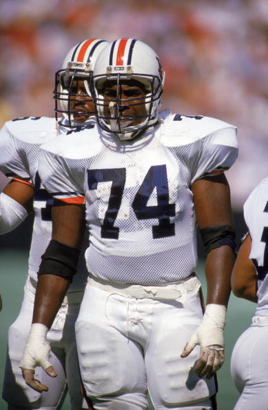 CIRCA -1988:  Tracy Rocker #74 of Auburn University stands on the field during a game against the Georgia Tech Bulldogs circa 1988. (Photo by: Allen Steele/Getty Images)