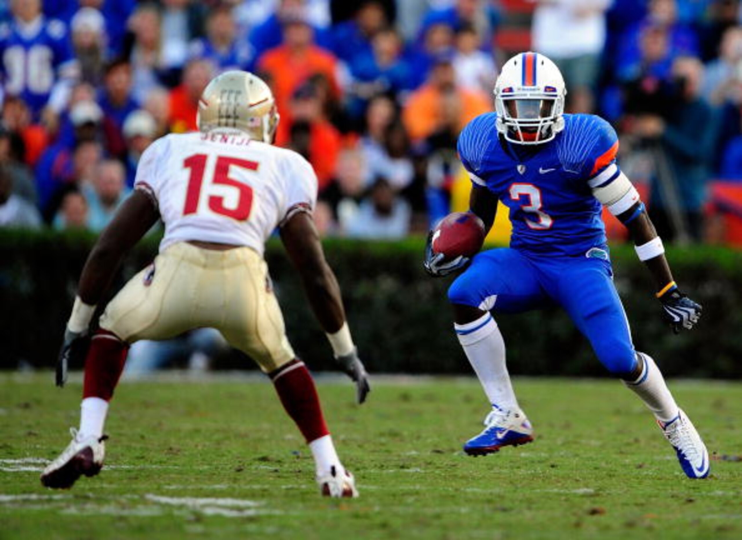 GAINESVILLE, FL - NOVEMBER 28: Chris Rainey #3 of the Florida Gators attempts to run past Ochuko Jenije #15 of the Florida State Seminoles at Ben Hill Griffin Stadium on November 28, 2009 in Gainesville, Florida. (Photo by Sam Greenwood/Getty Images) GAINESVILLE, FL - NOVEMBER 28: Chris Rainey #3 of the Florida Gators attempts to run past Ochuko Jenije #15 of the Florida State Seminoles at Ben Hill Griffin Stadium on November 28, 2009 in Gainesville, Florida. (Photo by Sam Greenwood/Getty Images)