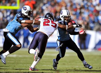 NASHVILLE, TN - DECEMBER 19: Chris Johnson #28 of the Tennessee Titans braks away from Kareem Jackson #25 of the Houston Texans during the first half at LP Field on December 19, 2010 in Nashville, Tennessee. (Photo by Grant Halverson/Getty Images) NASHVILLE, TN - DECEMBER 19: Chris Johnson #28 of the Tennessee Titans braks away from Kareem Jackson #25 of the Houston Texans during the first half at LP Field on December 19, 2010 in Nashville, Tennessee. (Photo by Grant Halverson/Getty Images)