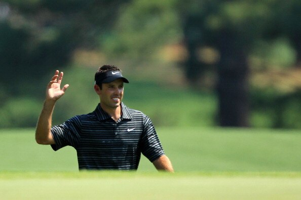 AUGUSTA, GA - APRIL 10:  Charl Schwartzel of South Africa waves to the gallery after holing a shot for eagle on the third green during the final round of the 2011 Masters Tournament on April 10, 2011 in Augusta, Georgia.  (Photo by David Cannon/Getty Imag